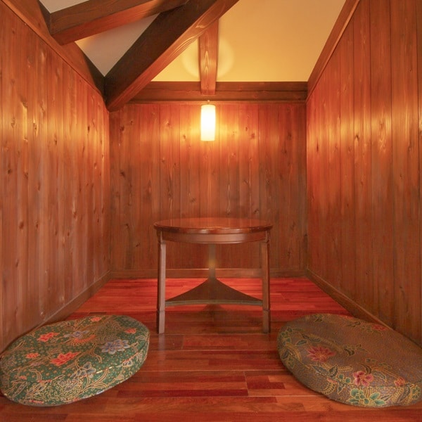 [Guest Room/101] The wood and plaster walls create a warm atmosphere.