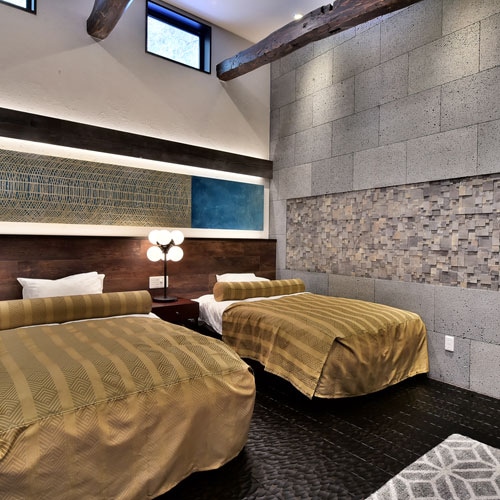 An example of a bedroom in the main room, equipped with a Simmons bed