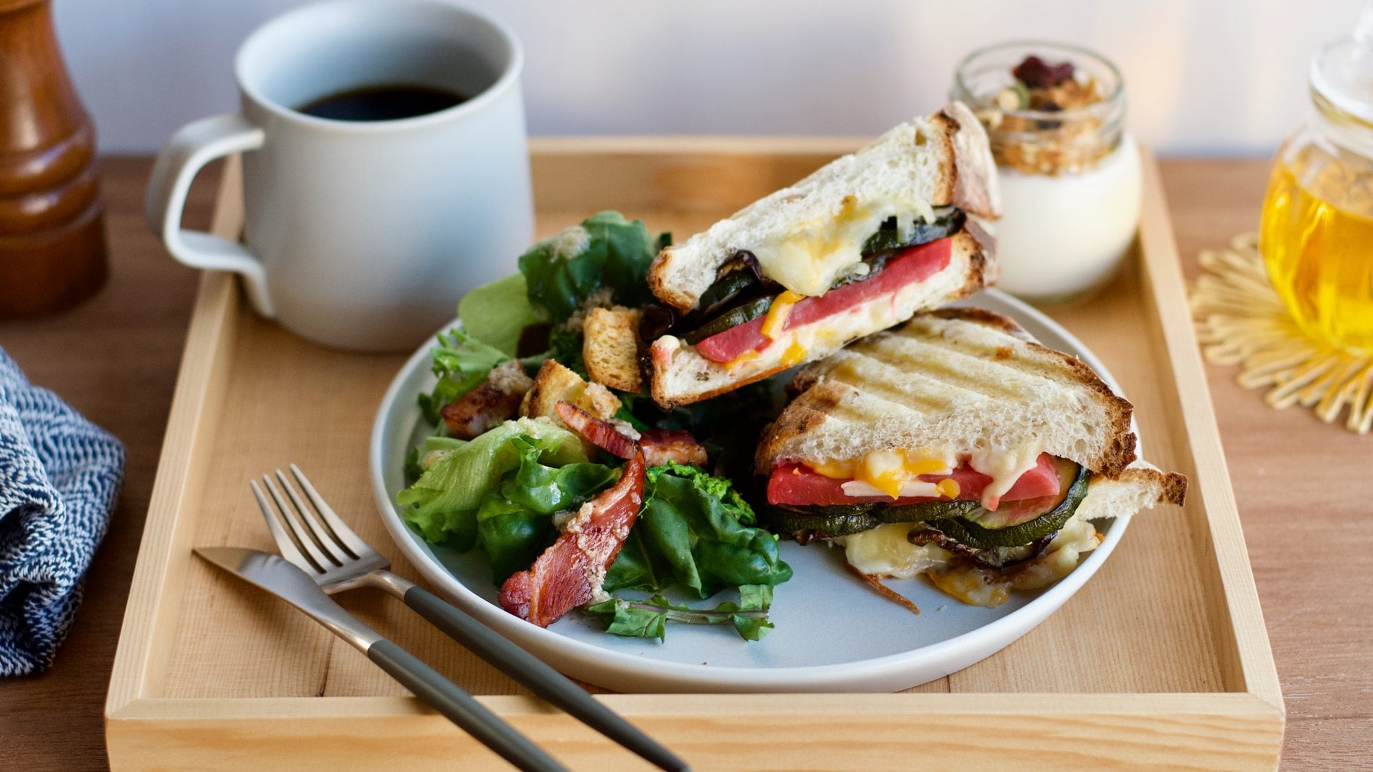 "Breakfast with delicious Hida Takayama" panini and colorful salad.