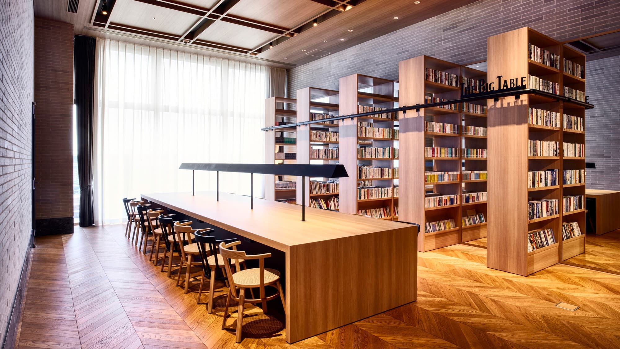 THE LIBRARY | the big table | The bookshelves are filled with books you'll want to read.