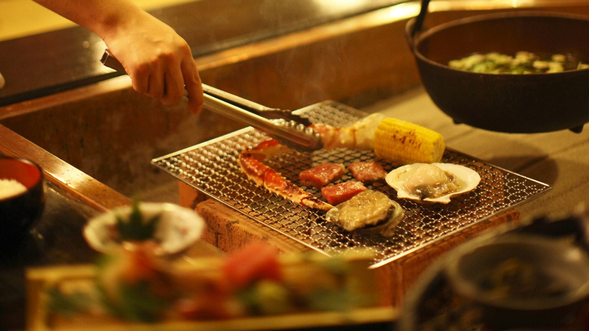 Enjoy a special Robata Kaiseki dinner in the nostalgic atmosphere of Sansa-tei. *Image for illustration purposes only.