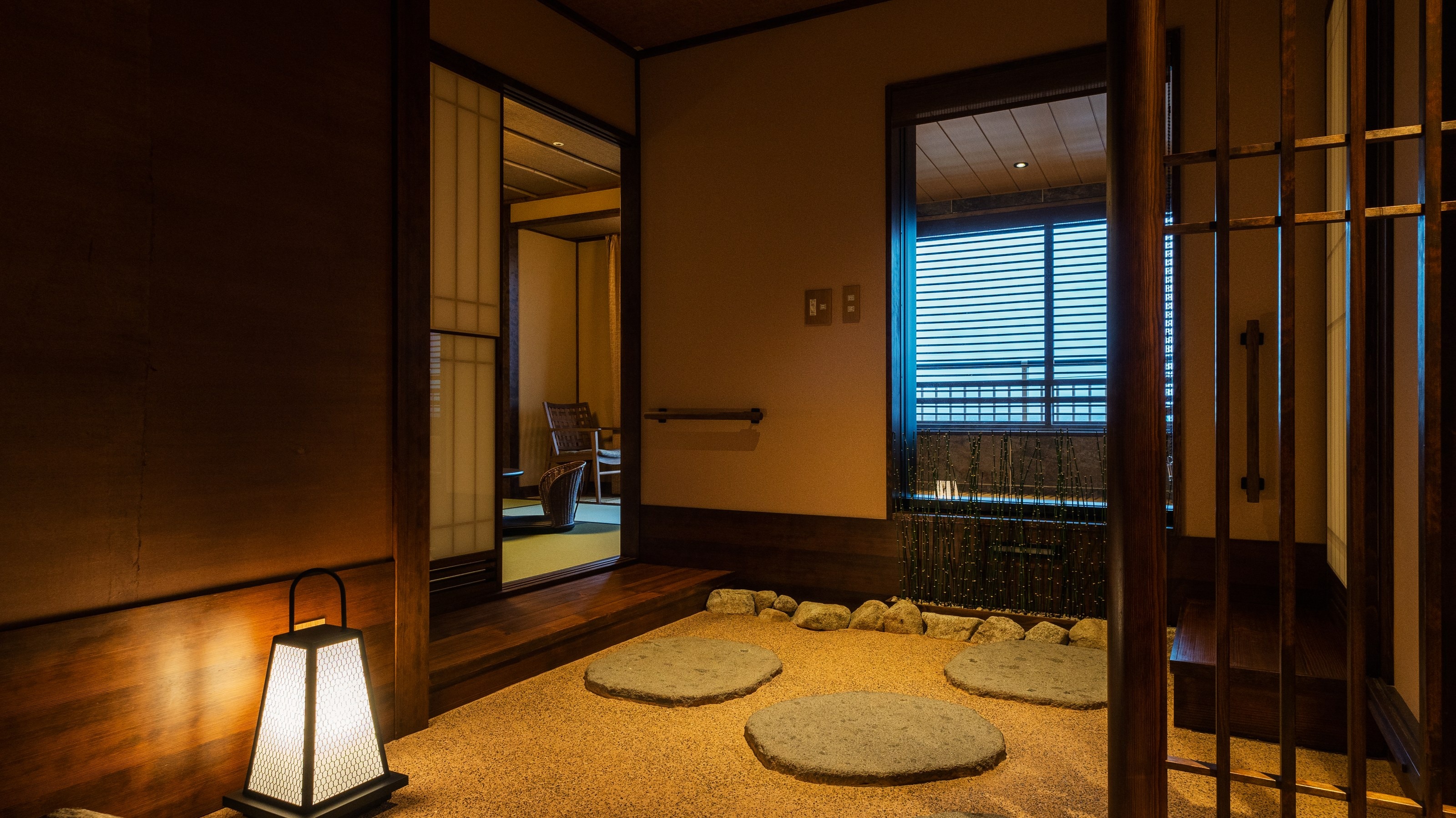 Japanese-style room entrance with a semi-open-air garden