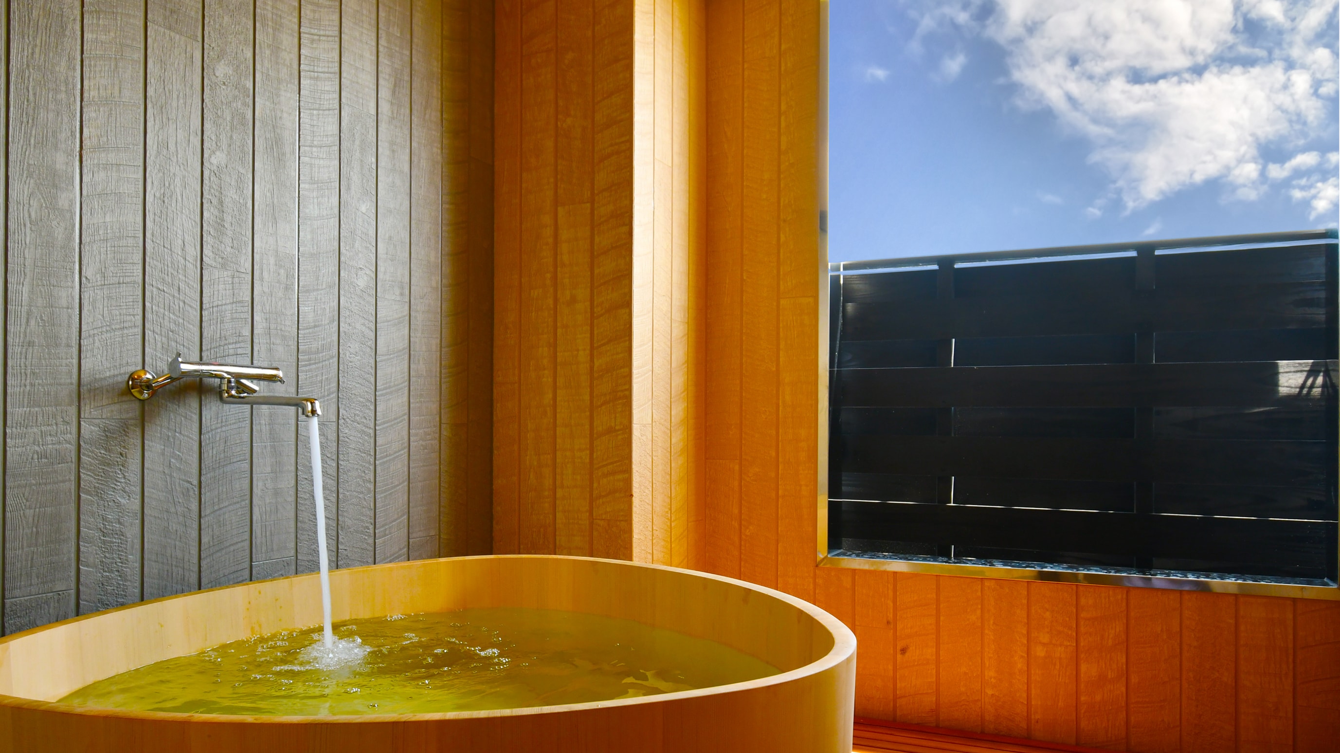 Wooden-themed guest room with open-air bath/403