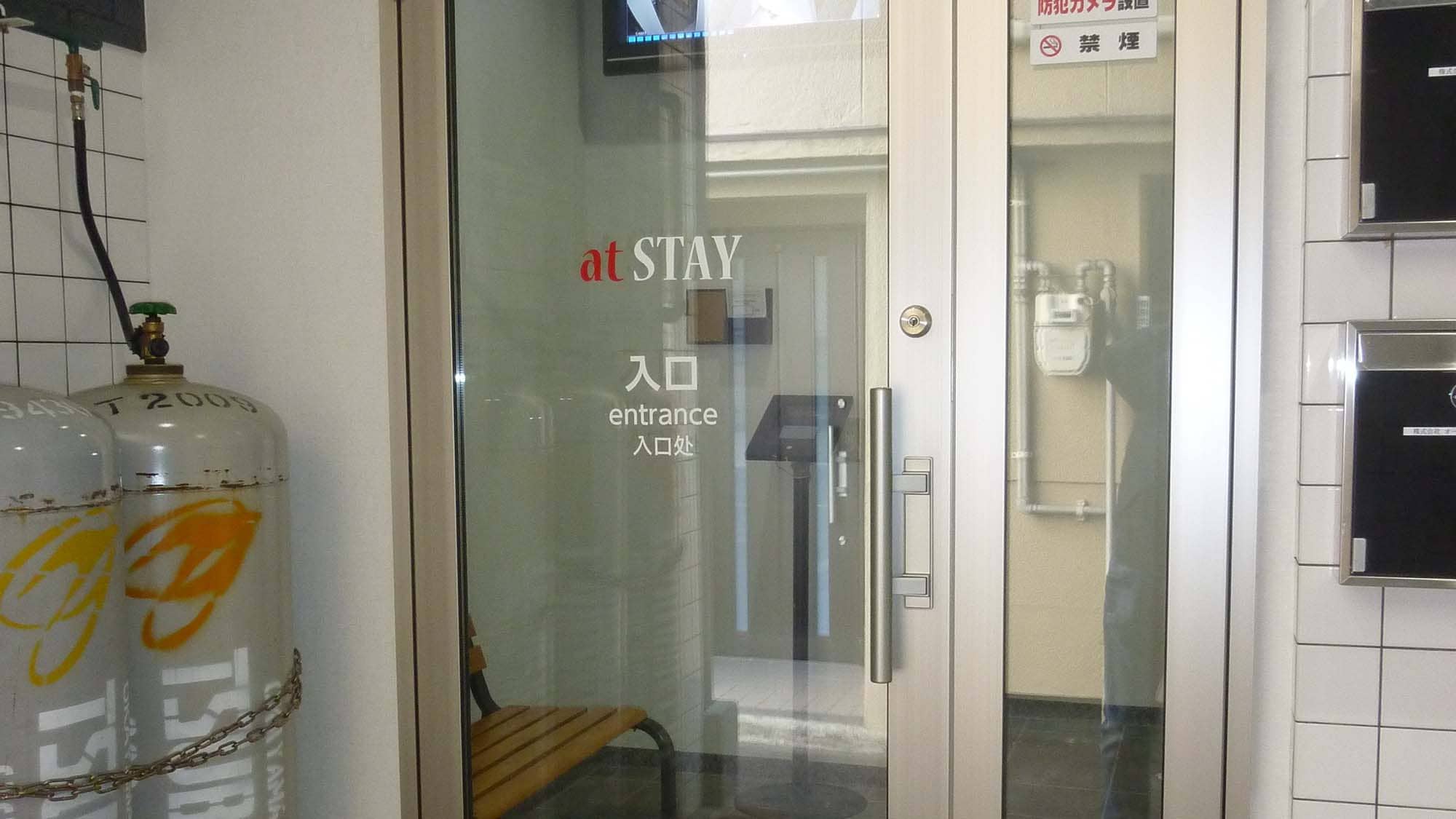 ・ The entrance to the building. Located on the back of the building