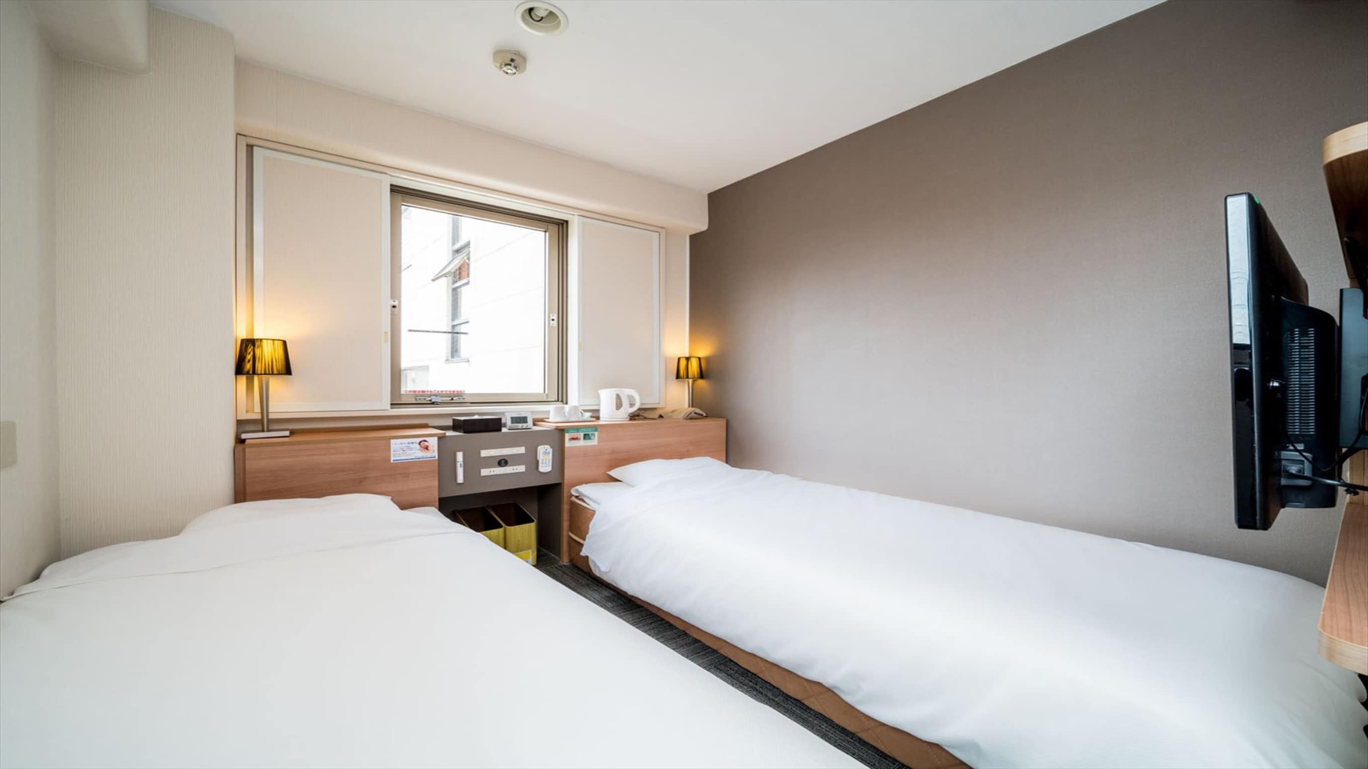 This room has two beds (90cm wide x 2).
