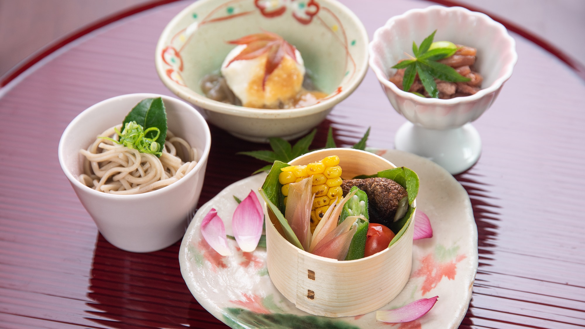 *An example of a standard kaiseki meal. Colorful small dishes are lined up.