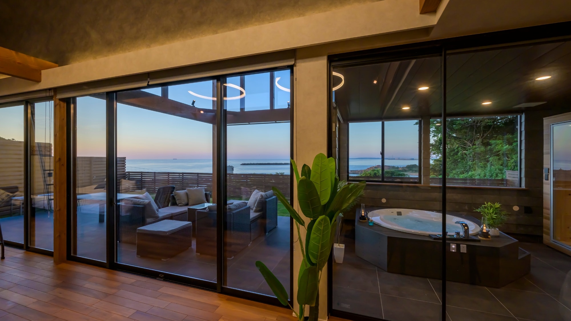 A relaxing bath while gazing at the ocean.