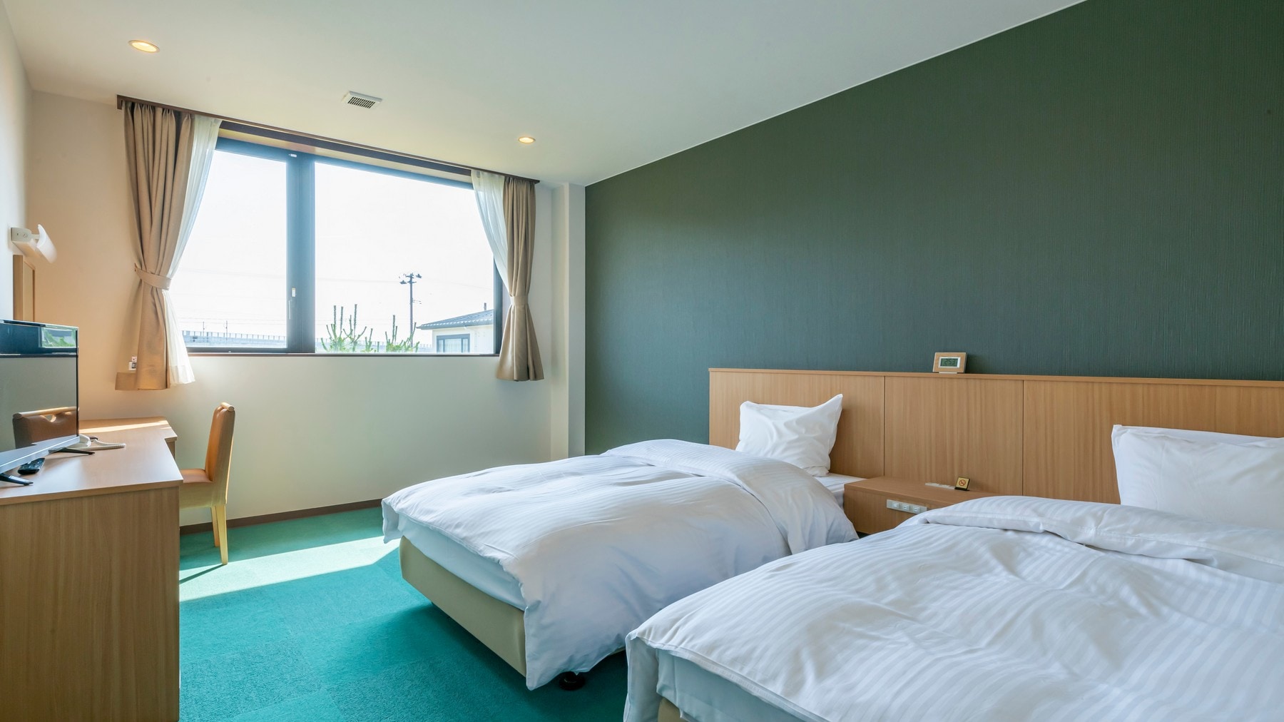 [Standard Twin Room] A room with a refreshing green hue and the image of Matsushima's nature