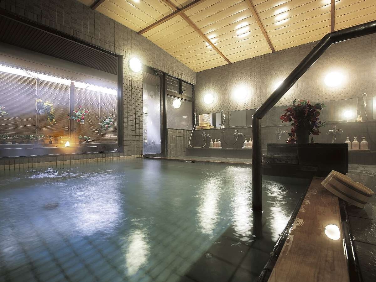 A large bath filled with steam, warming your body to the core.