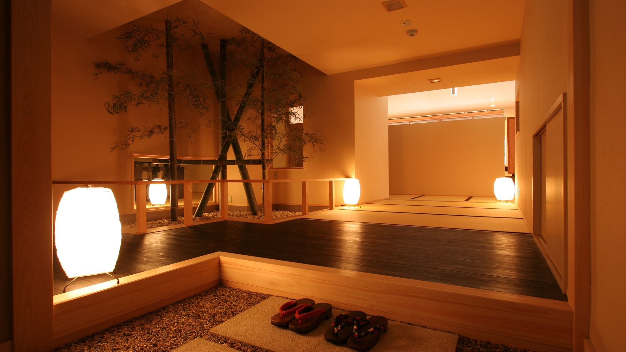 "Ryotei Dining". A low table and chairs are set in a private room with tatami mats.