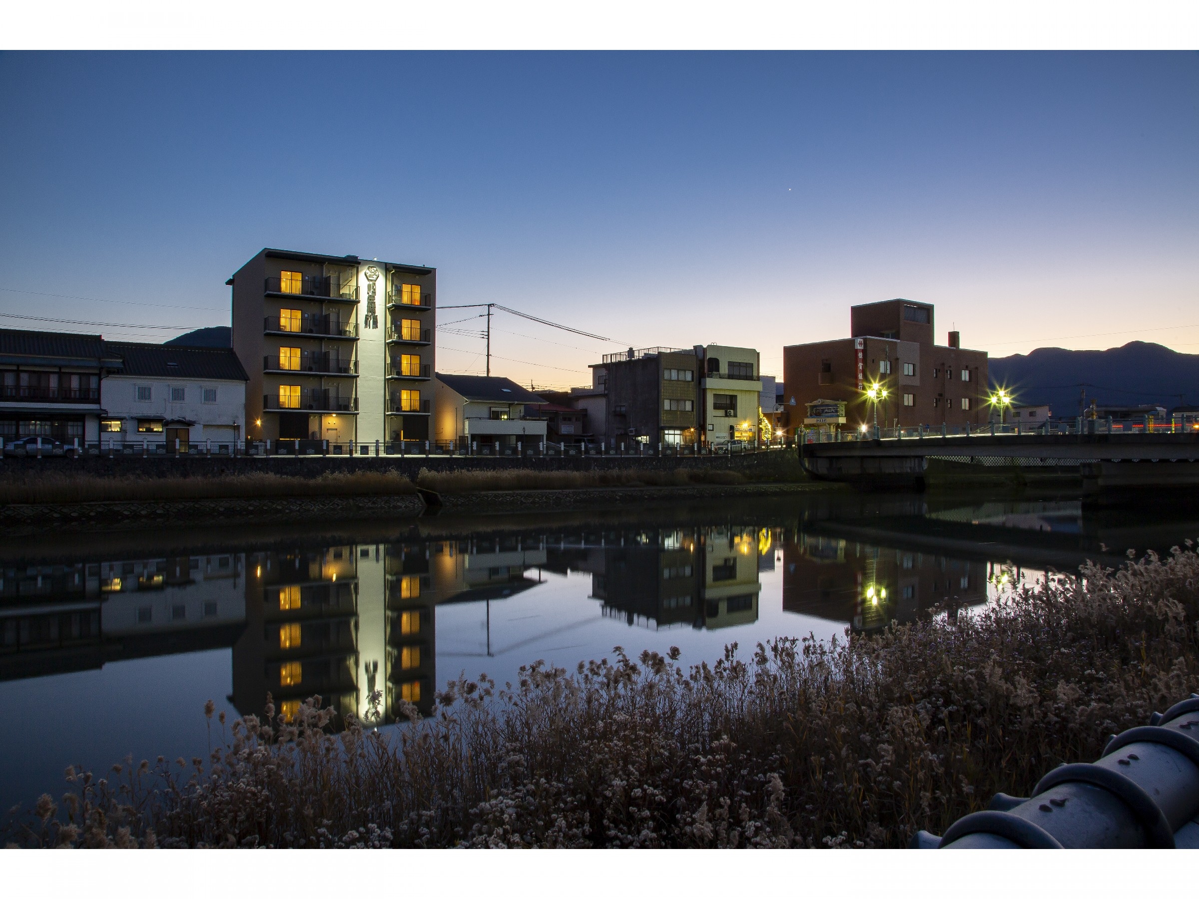 Exterior night view from the river side