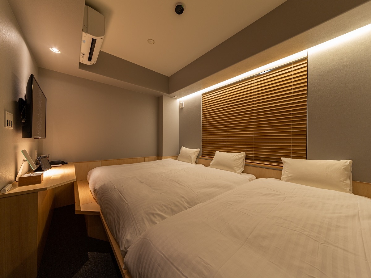 Kamar Tiga Orang