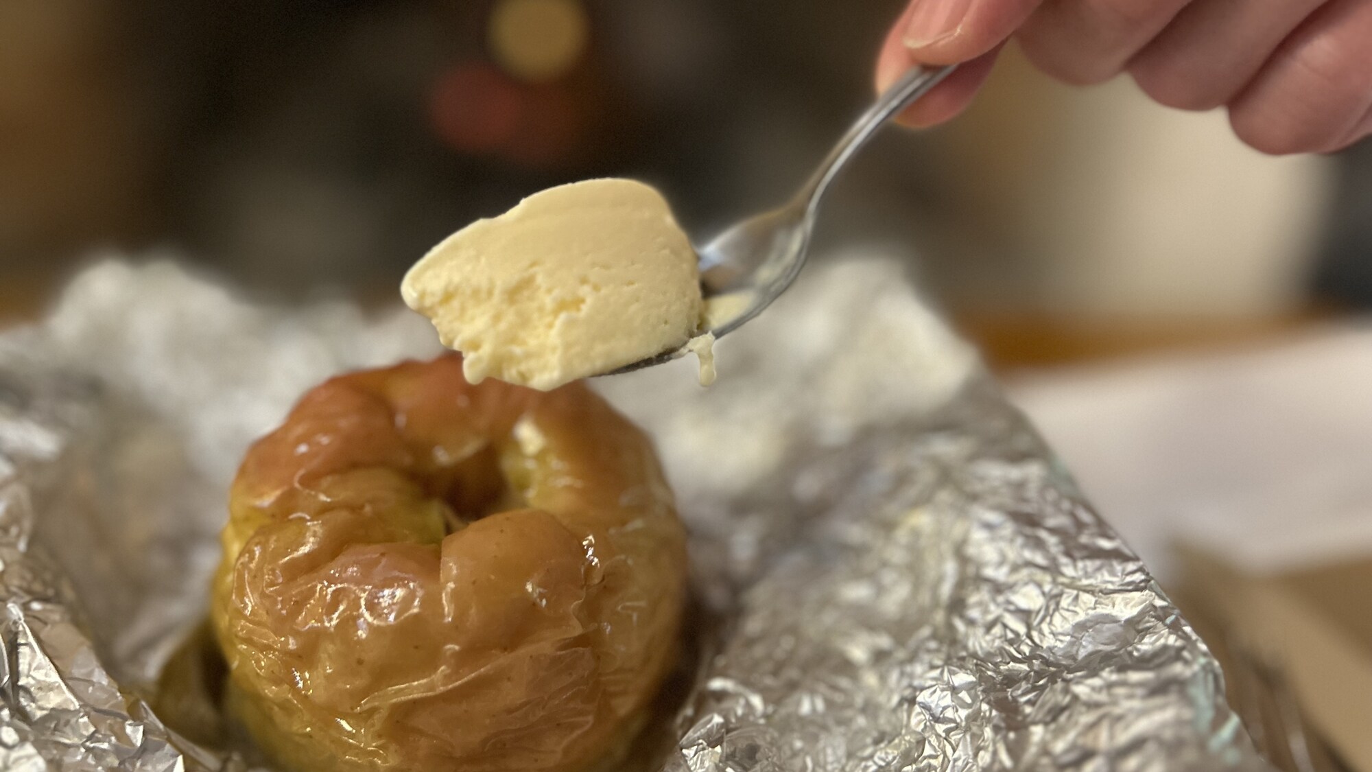 Hot apples roasted over an open fire topped with Jersey ice cream!