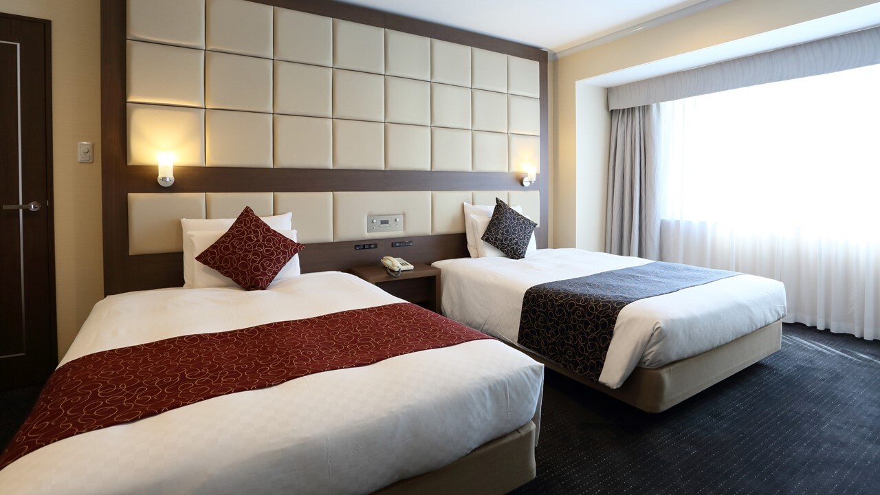 Perpanjangan / Junior Suite Twin (Kamar Tidur)