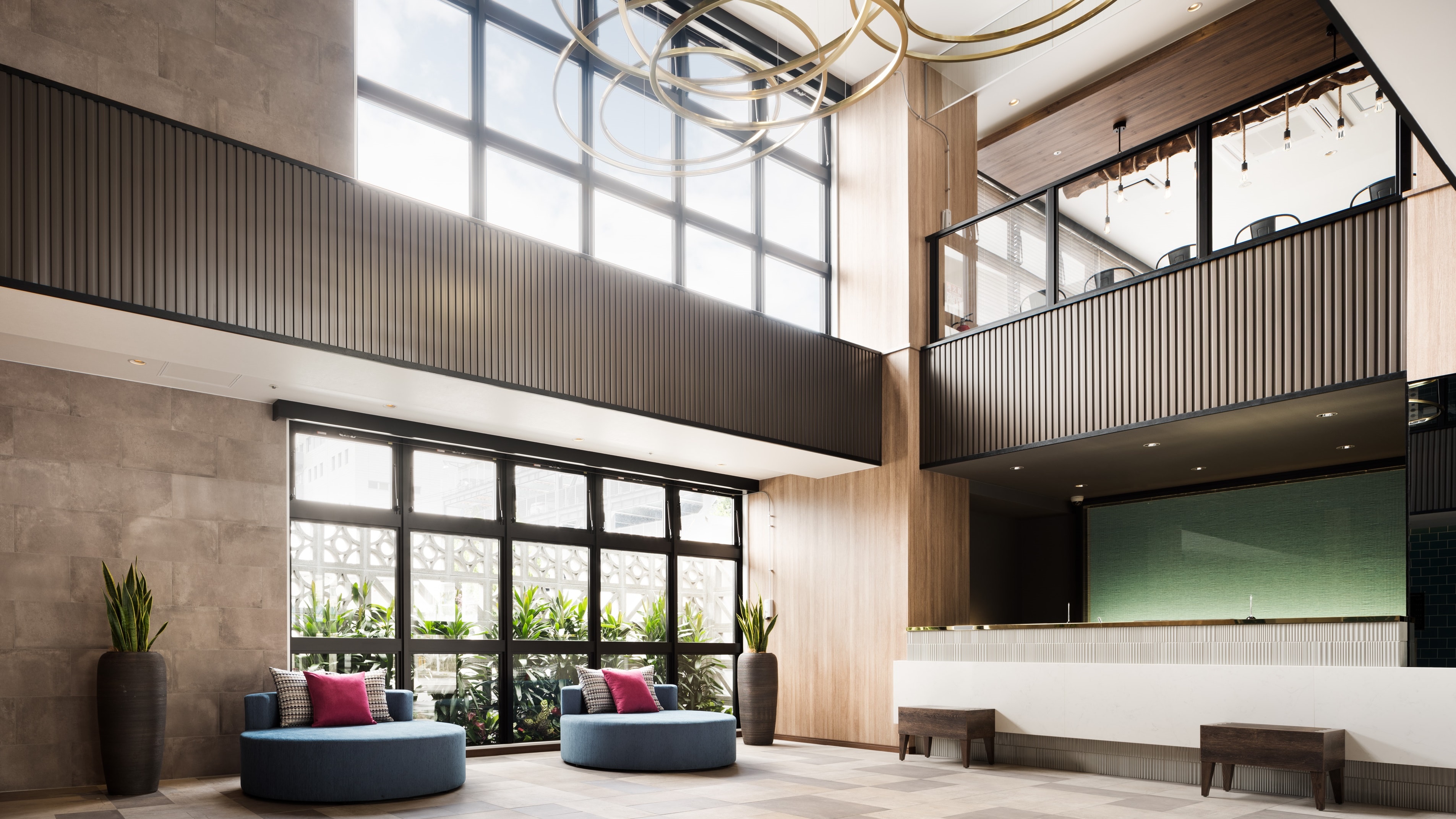 We welcome our guests in a spacious lobby with large windows.