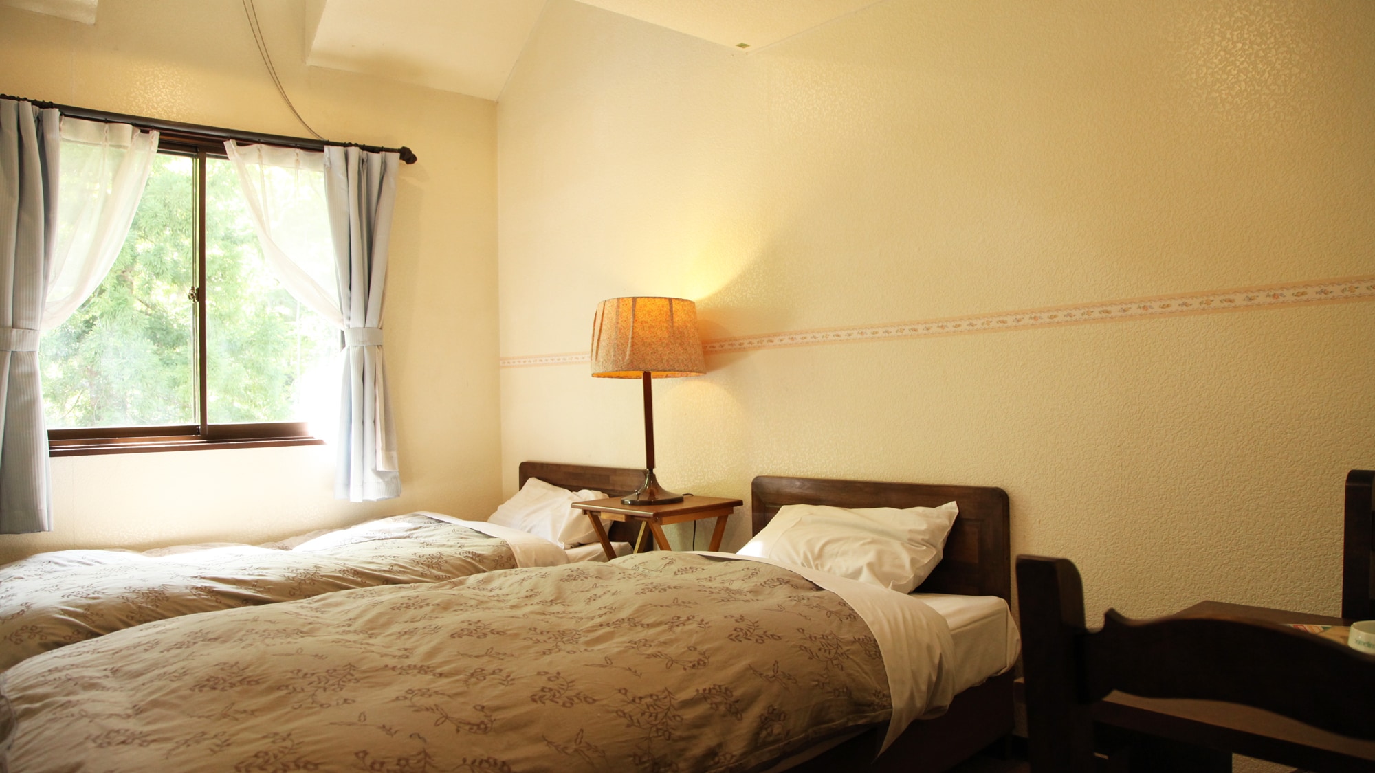 *[Western-style Twin Room] A 10m2 Western-style twin room with two single beds.