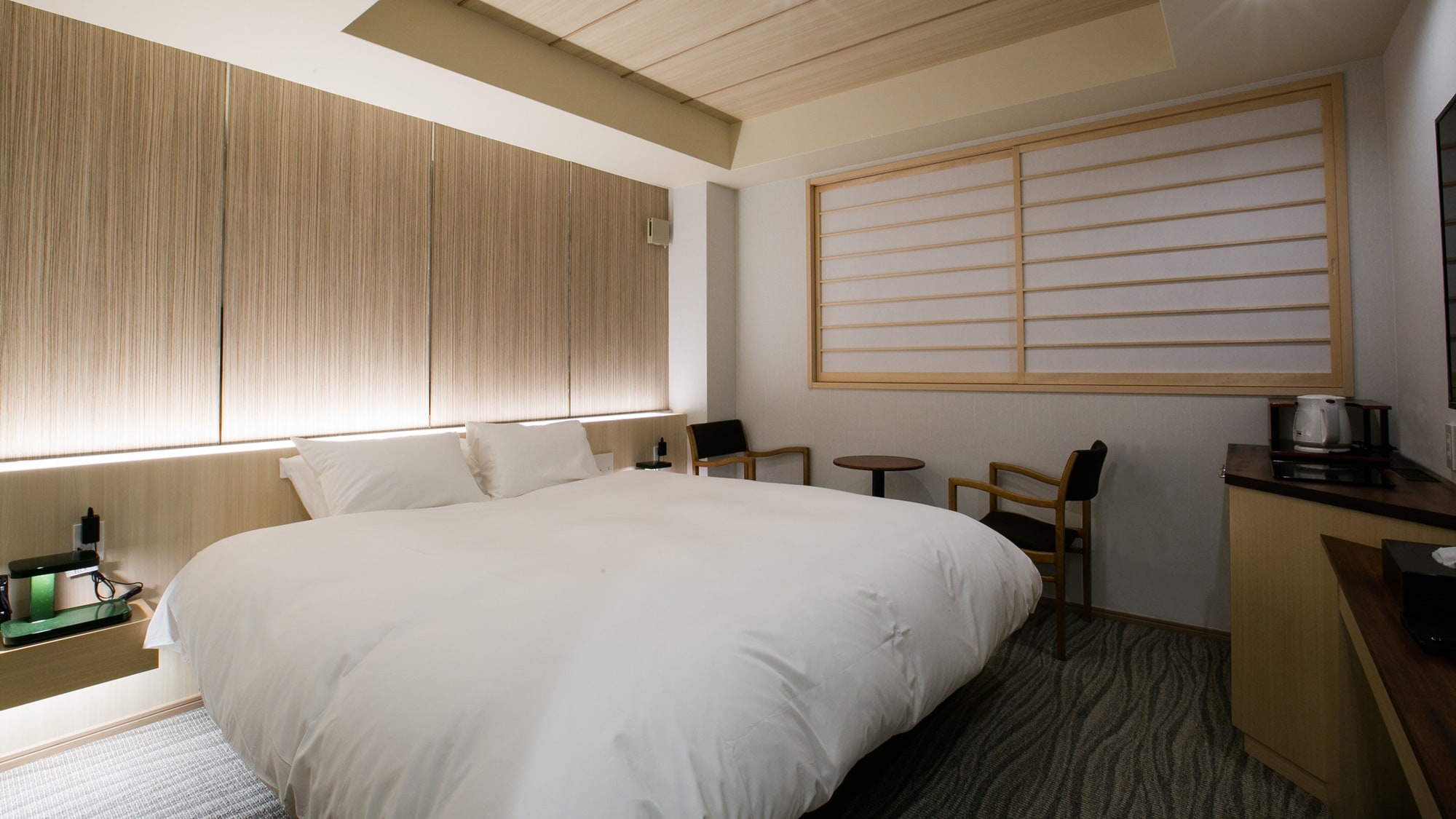 *[Double] Relax and unwind in our modern rooms.