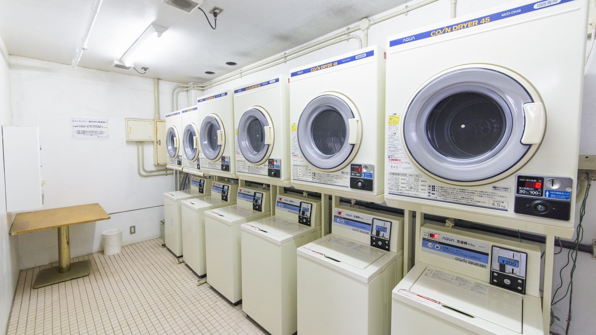 Coin laundry | Spacious coin laundry space, perfect for long-term stays