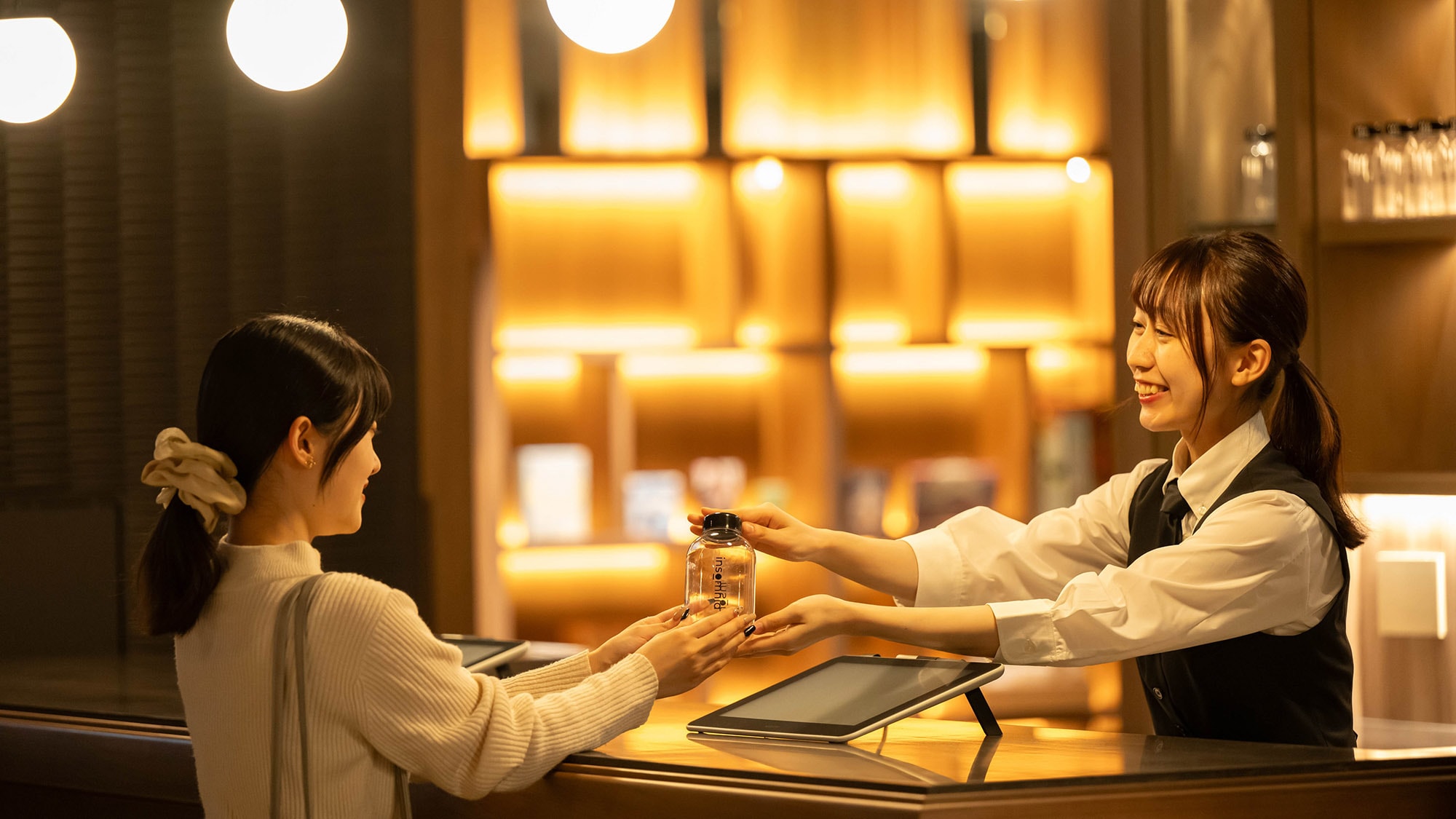 You will be given your own bottle when you check in. Please fill it with a free drink and use it when you go out.