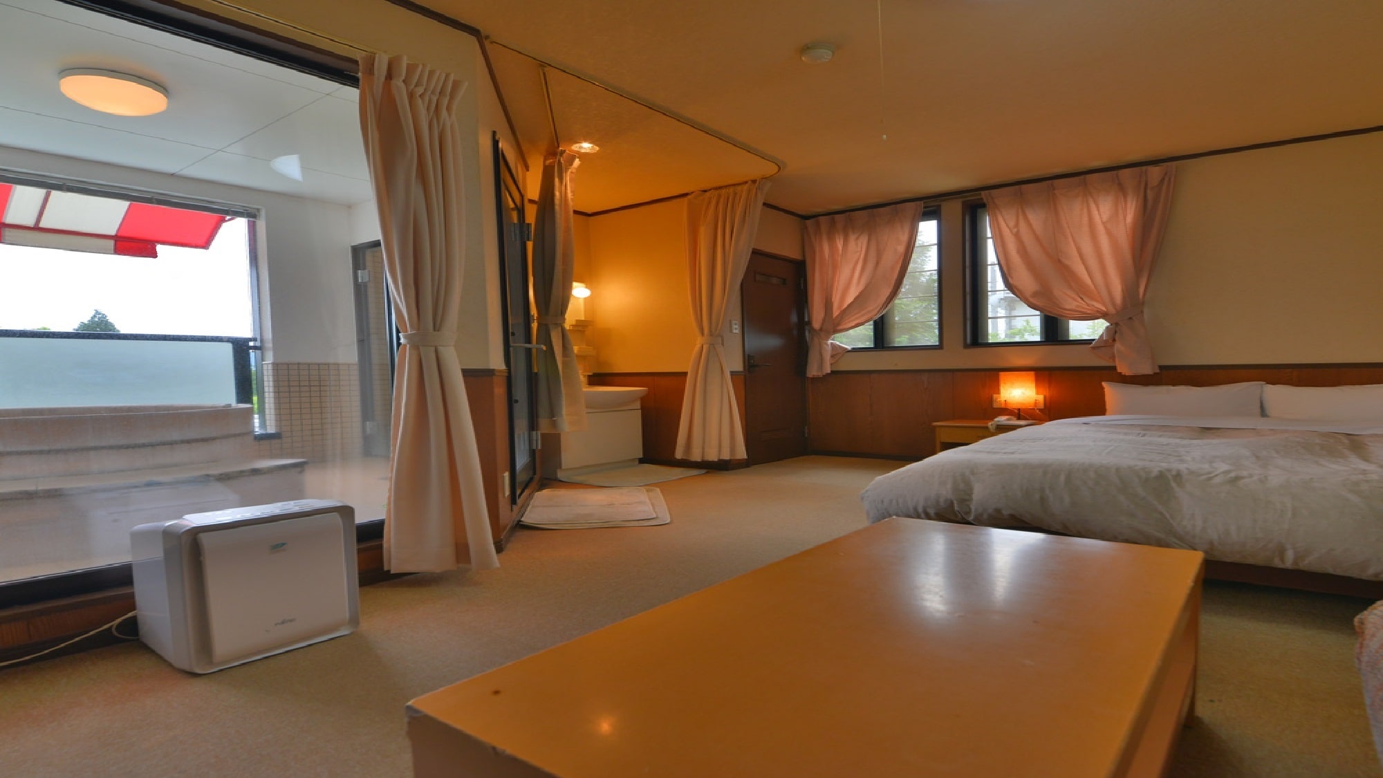 An example of a guest room with a terrace and open-air bath