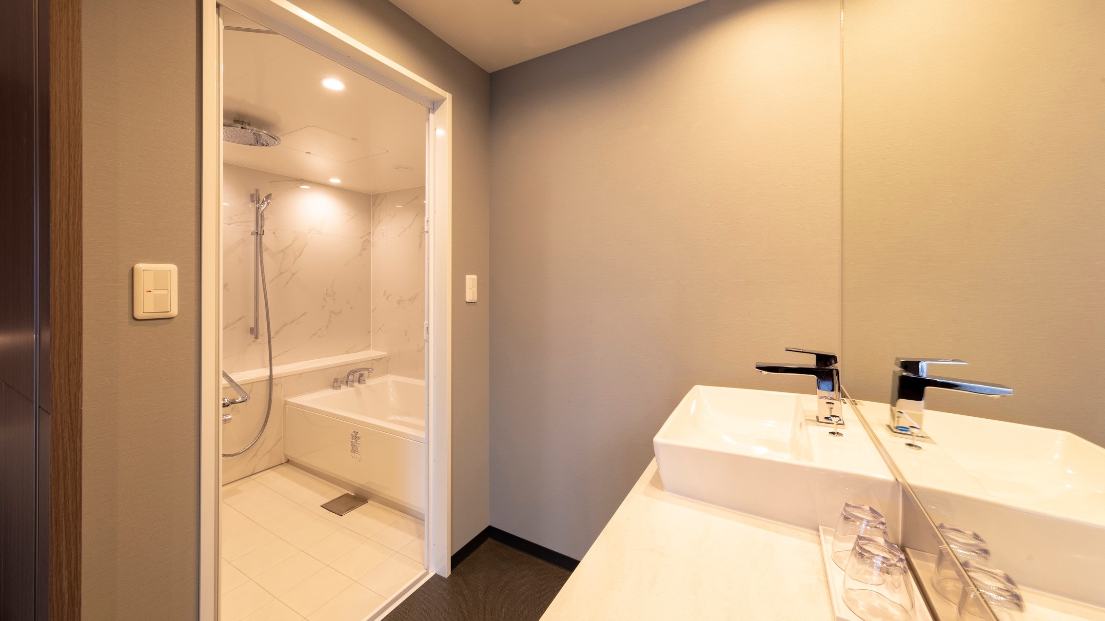 Refresh the tiredness of your trip with a rain shower