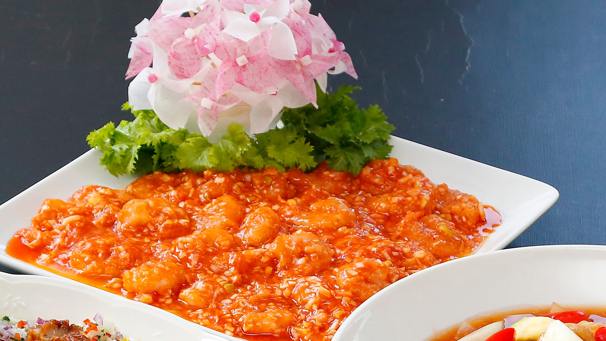 *[Example of a buffet] A buffet filled with authentic Chinese cuisine and dishes using local ingredients