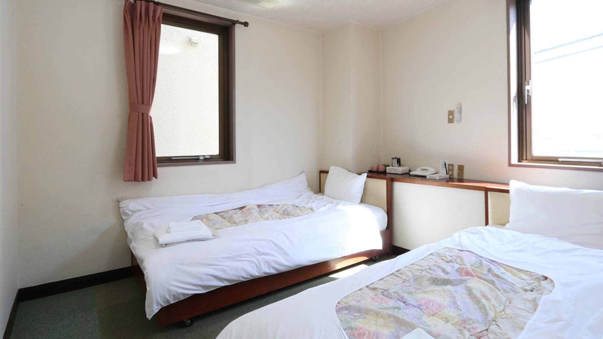 A Japanese-Western style room with bright windows for an open feel.