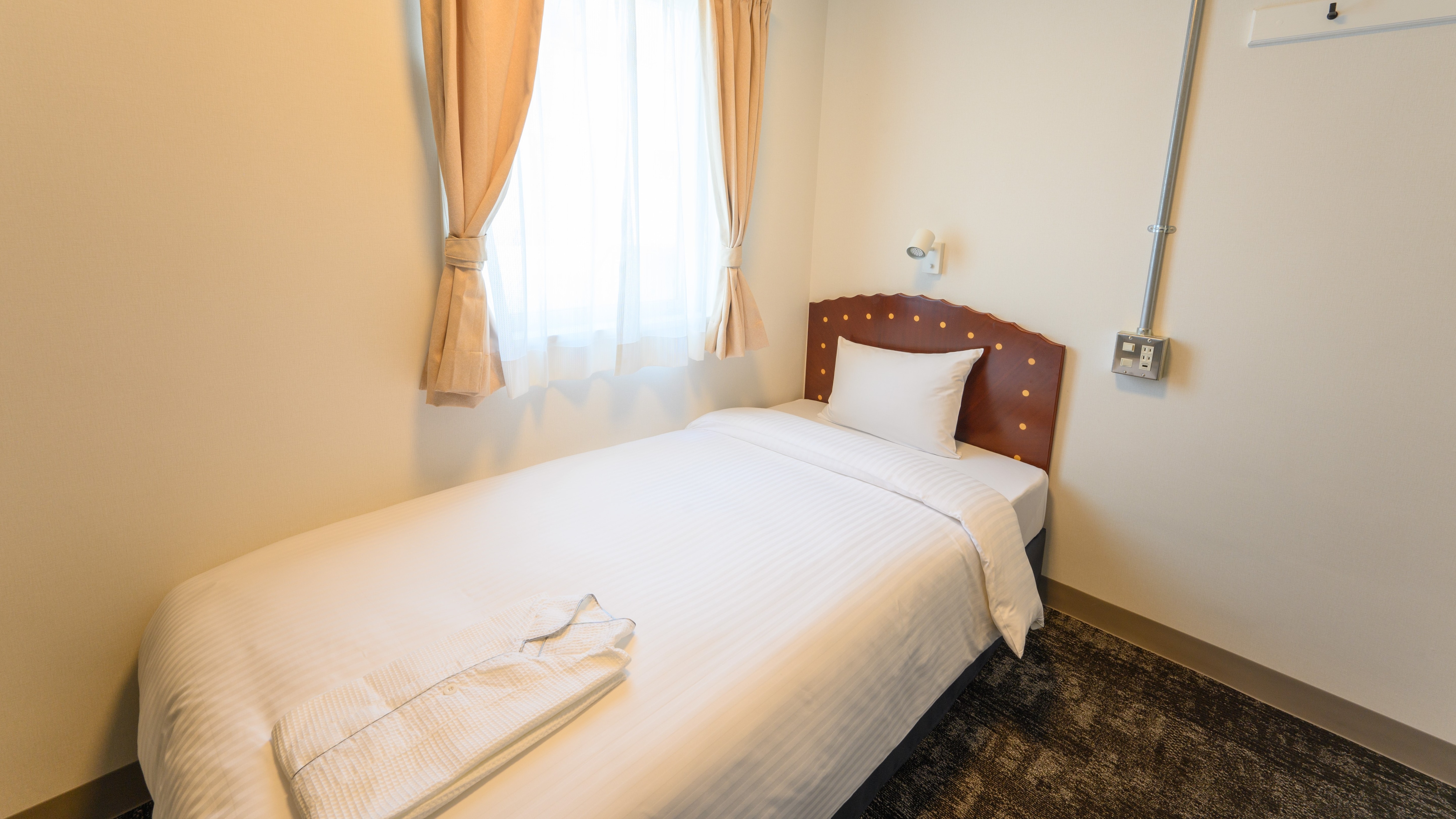 Standard room recommended for single/simple stays. (Example of a guest room)