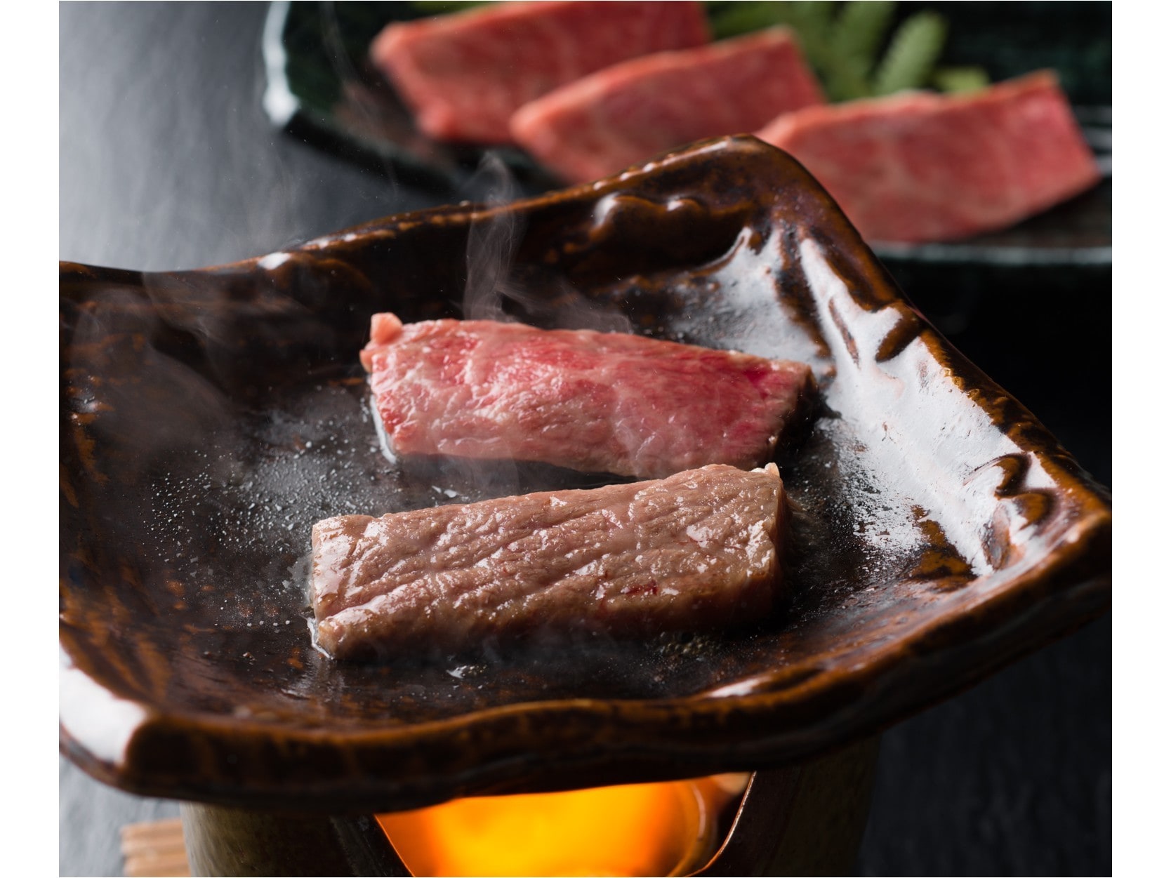 Grilled beef on a ceramic plate