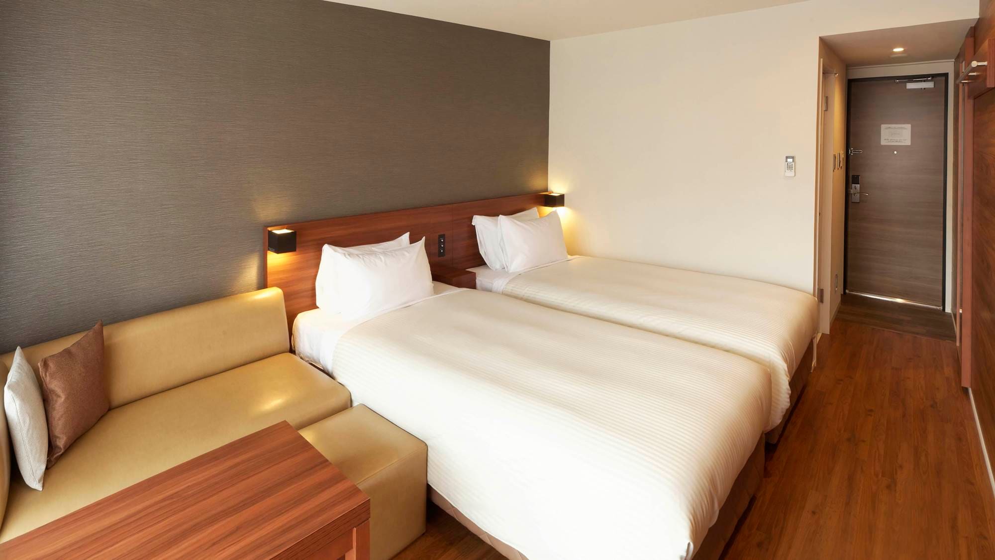 《北館》中型雙床房（19㎡） 北館以溫暖的木紋為基礎，營造出輕鬆的氛圍。