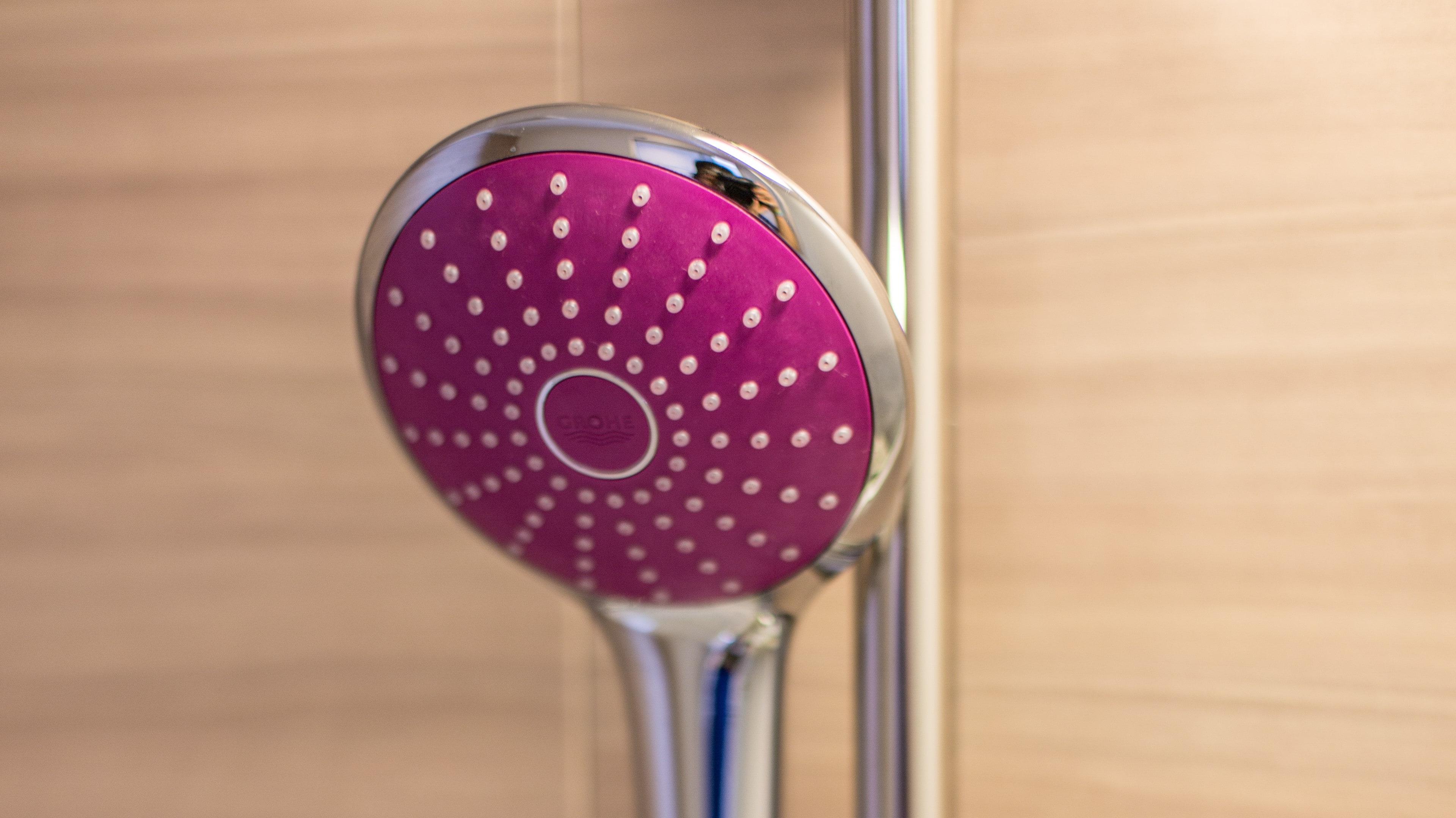 Shower head "Euphoria made by Grohe, Germany." Available in 5 different colors for each guest room.