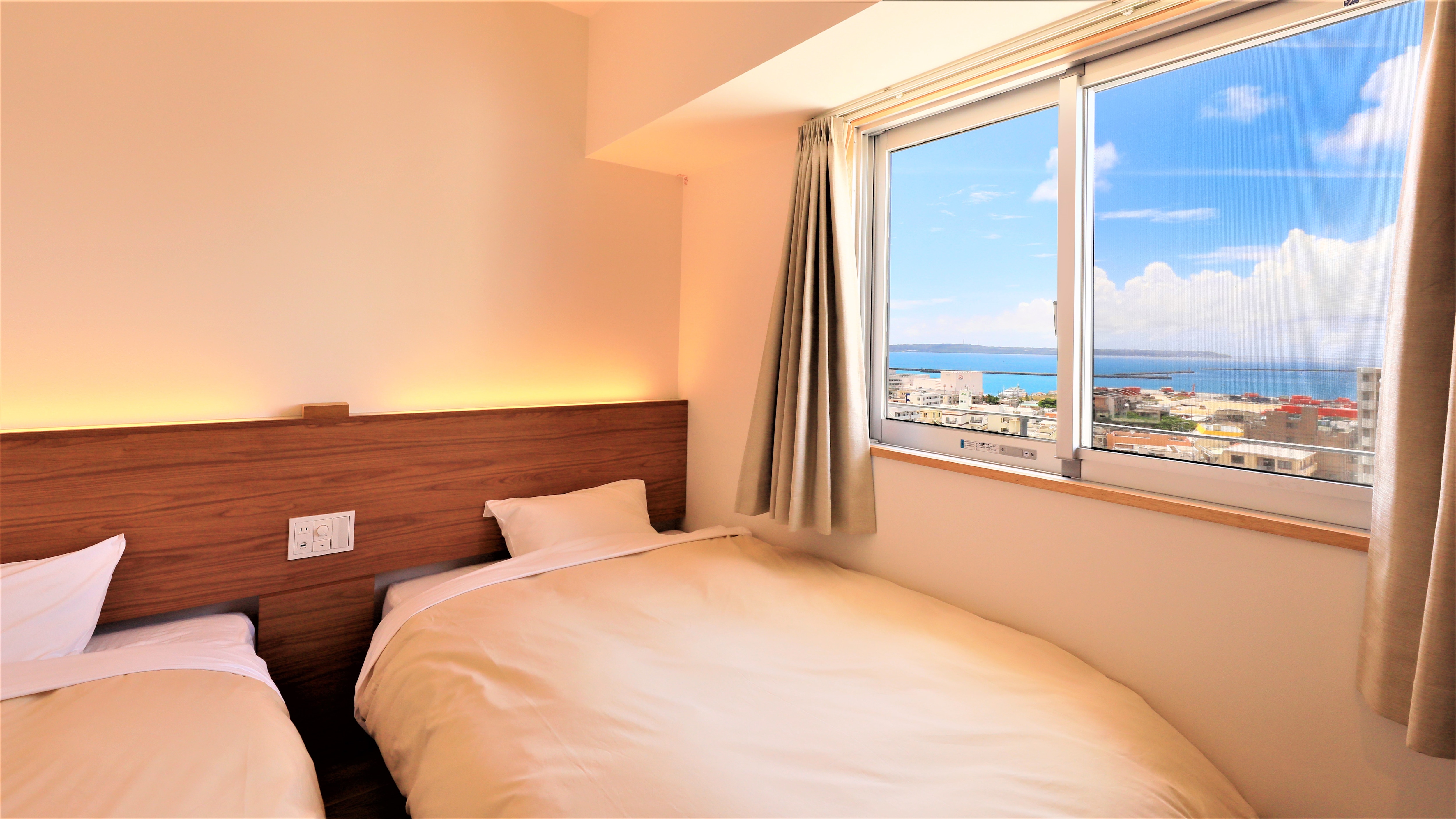 【新樓雙床房】從樓上可以眺望大海。