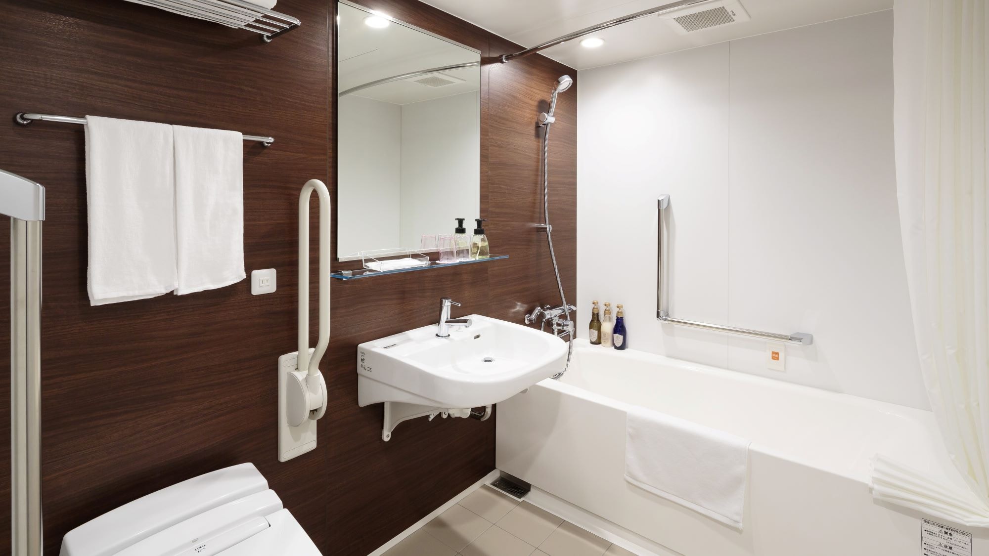 In-room bathroom (accessible twin)