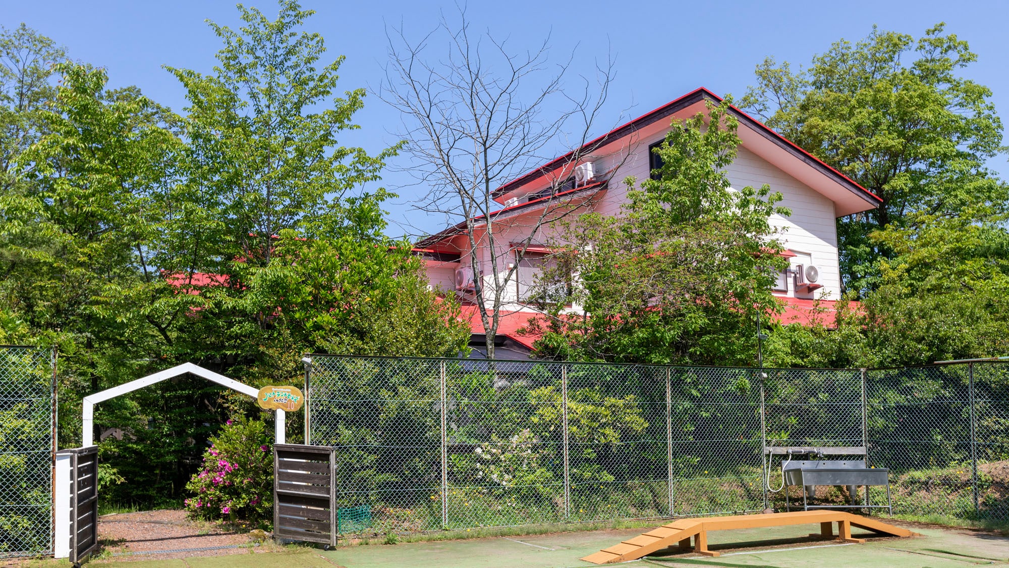 Exterior of house with dog run
