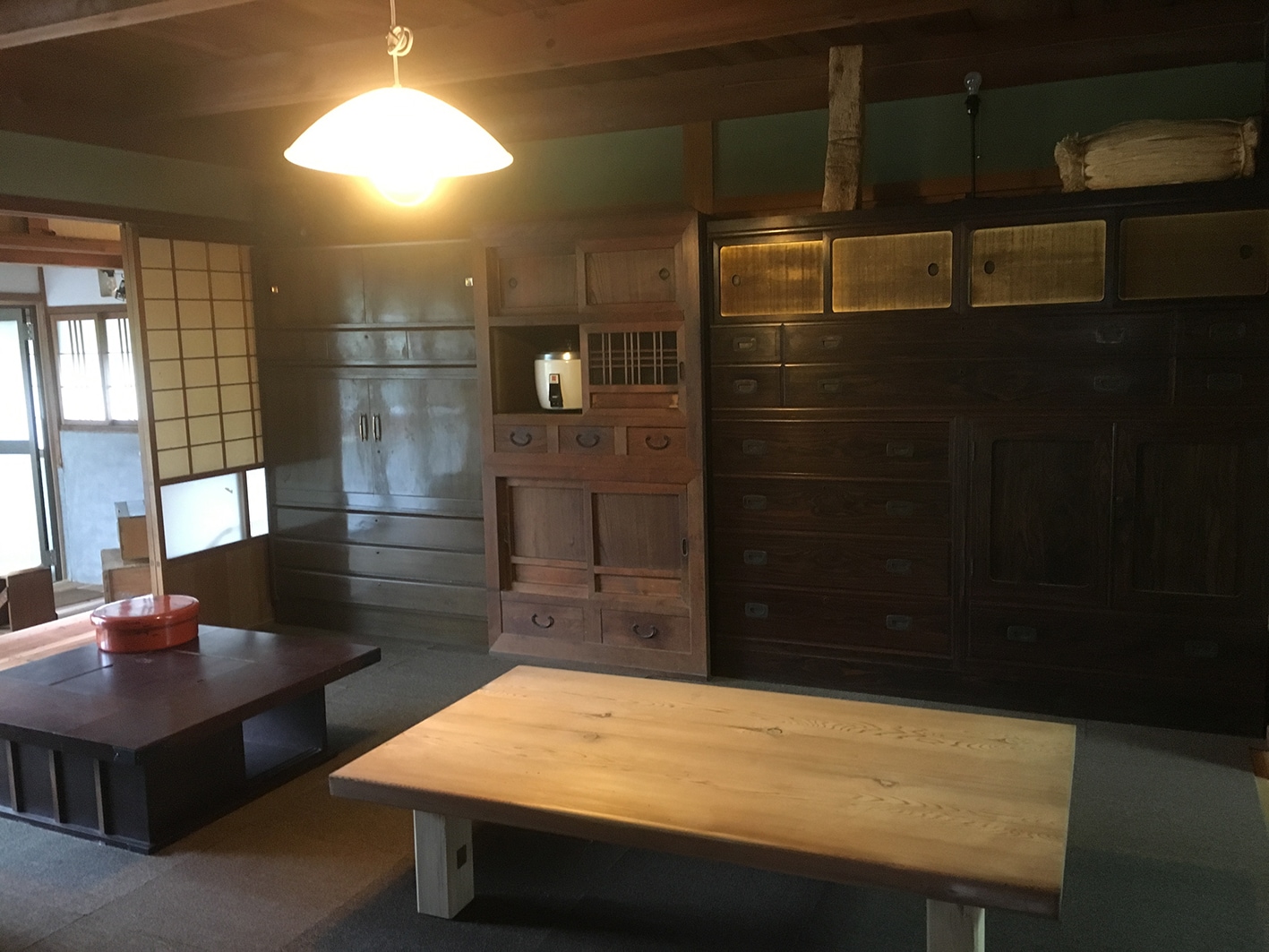 Living room surrounded by chest of drawers on the 1st floor