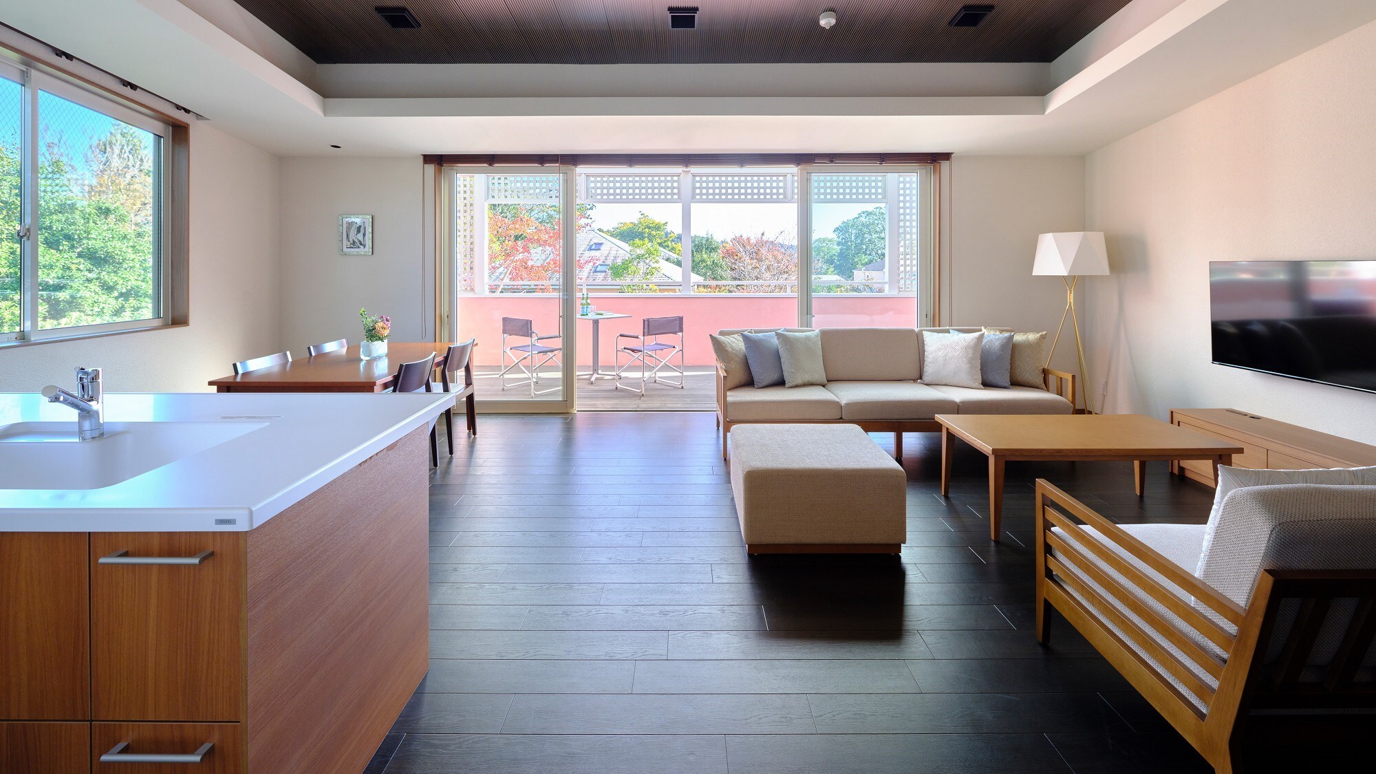[South Wing Superior Suite] Spacious living and dining room with an island kitchen