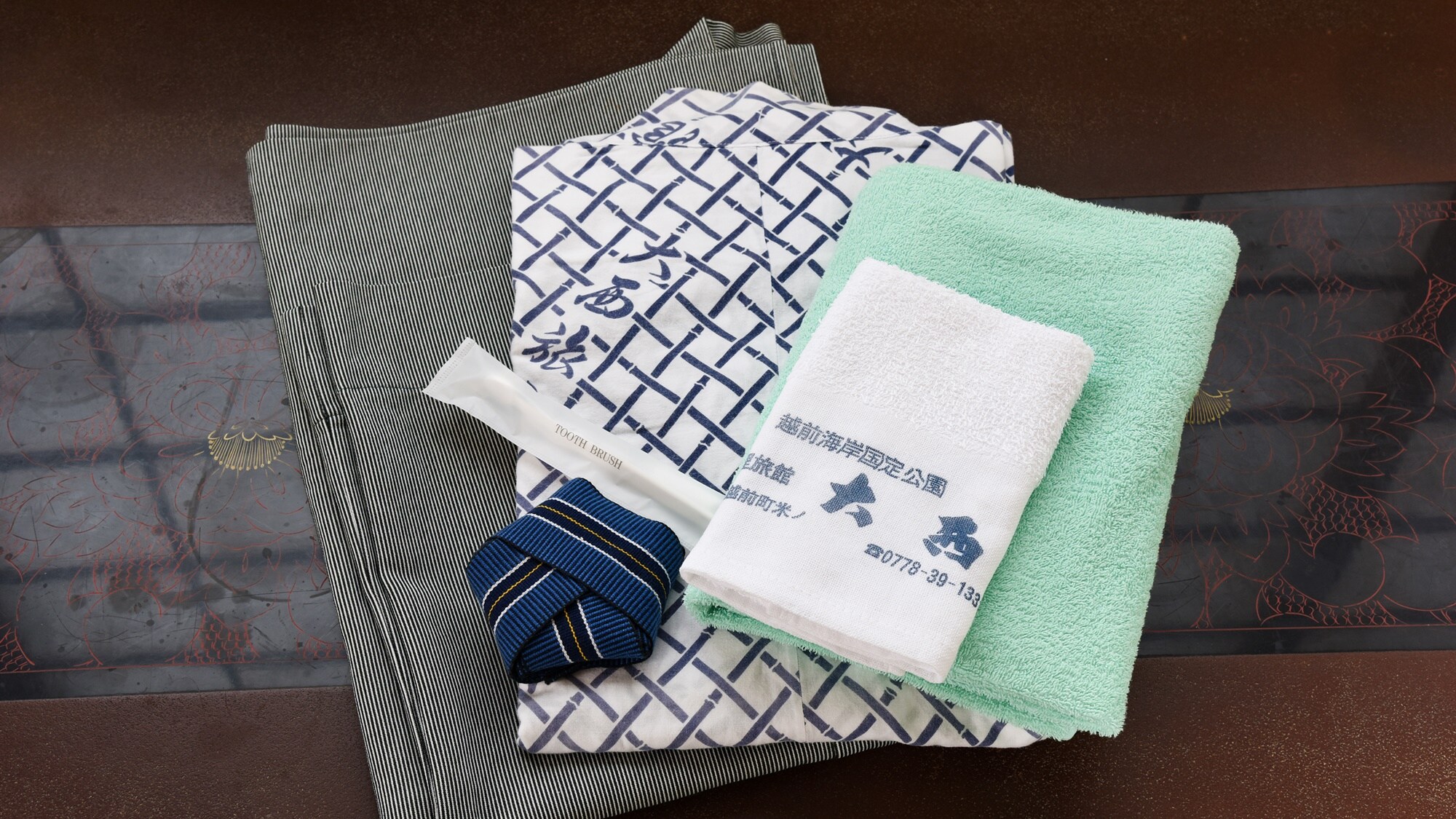 * [Contoh fasilitas] Kami juga memiliki fasilitas seperti yukata dan set sikat gigi.