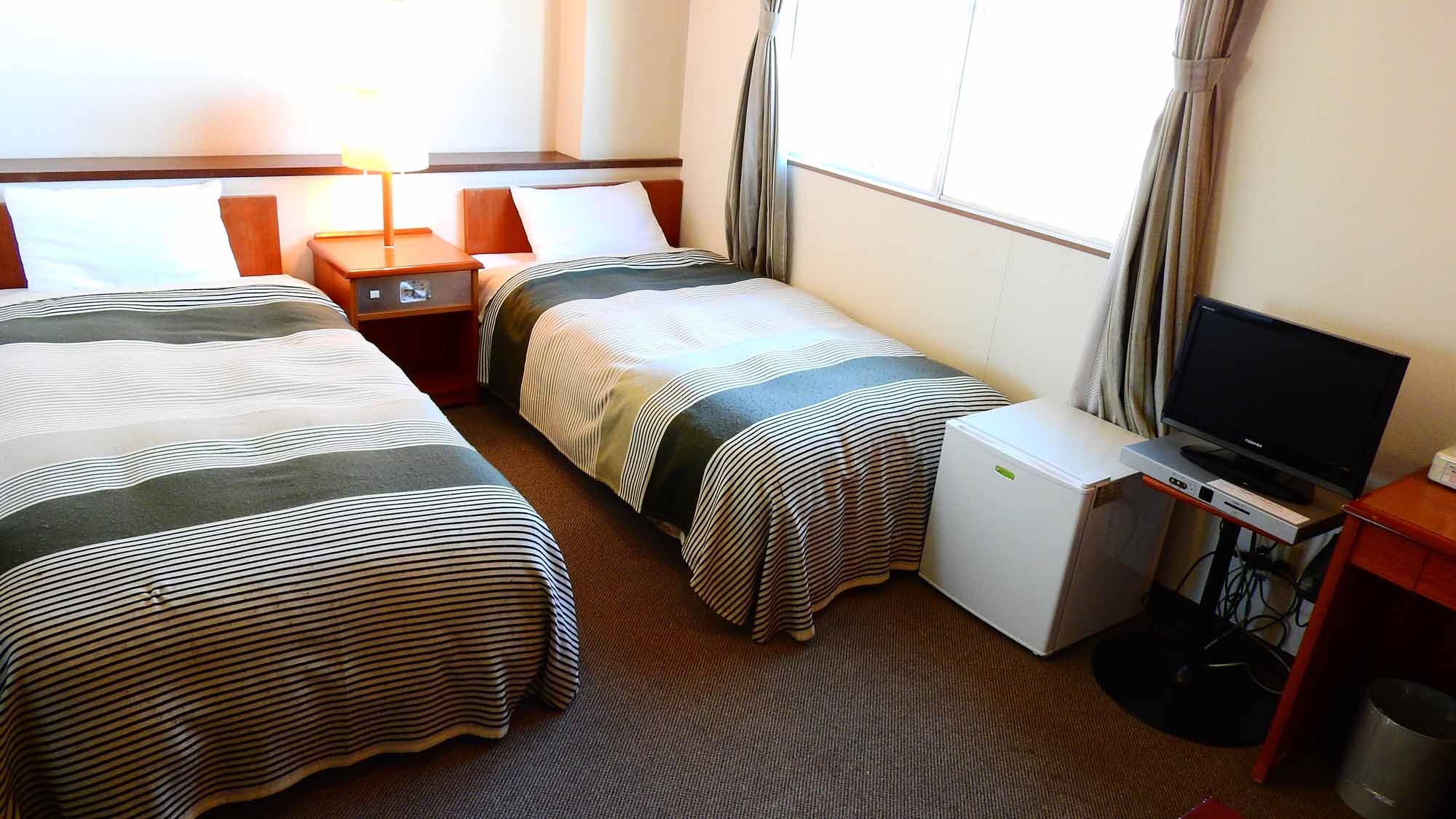 * Example of twin (with bath and toilet) Approximately 13 square meters Wireless LAN connection OK! Smoking and non-smoking rooms are available. It was