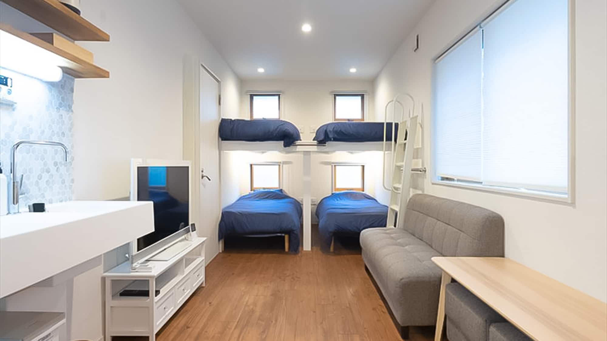 ・Room B Living room/bedroom: 4 beds