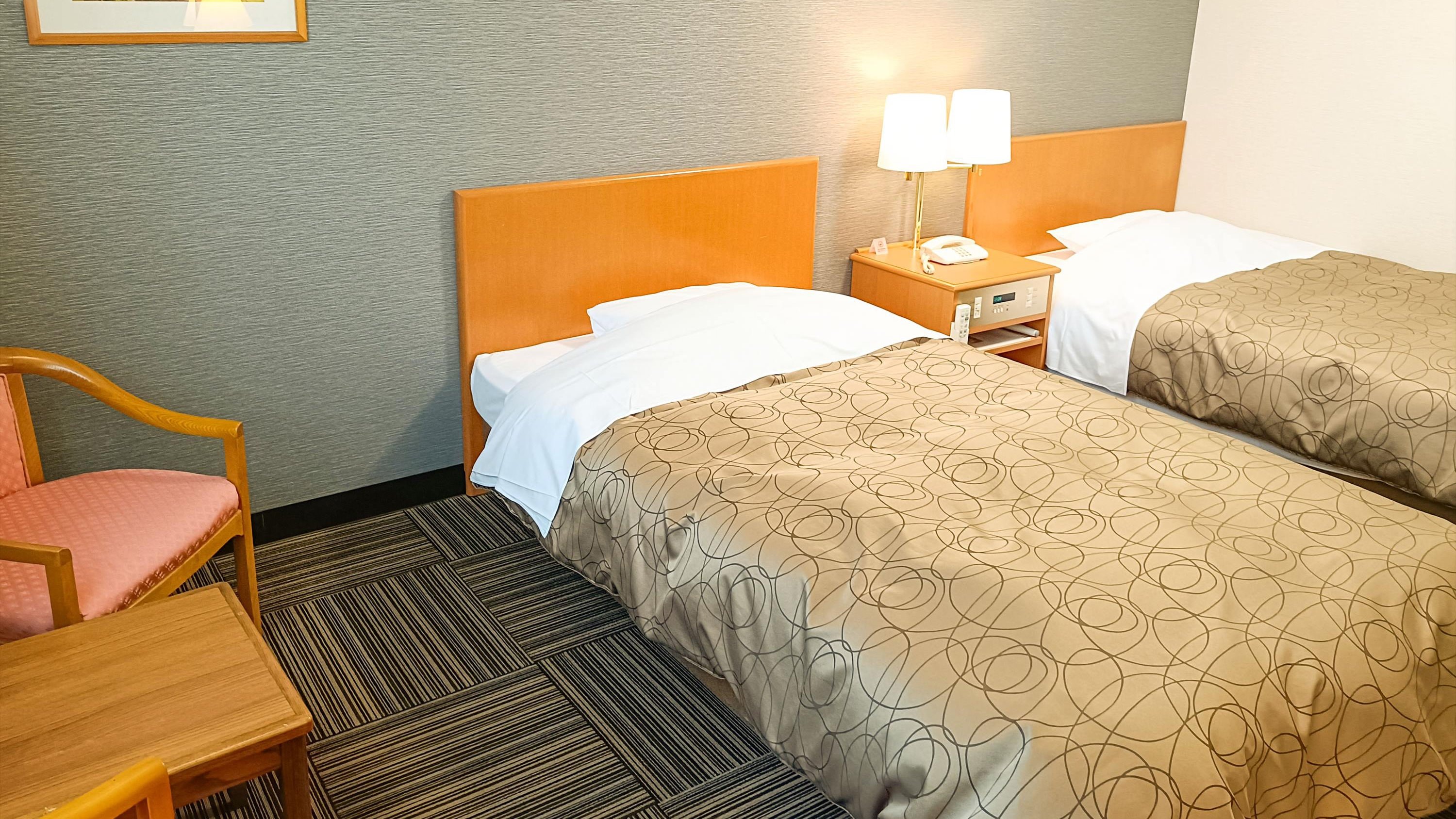 [Deluxe Twin] Interior yang menenangkan membuat masa menginap Anda lebih nyaman untuk bisnis atau tamasya.