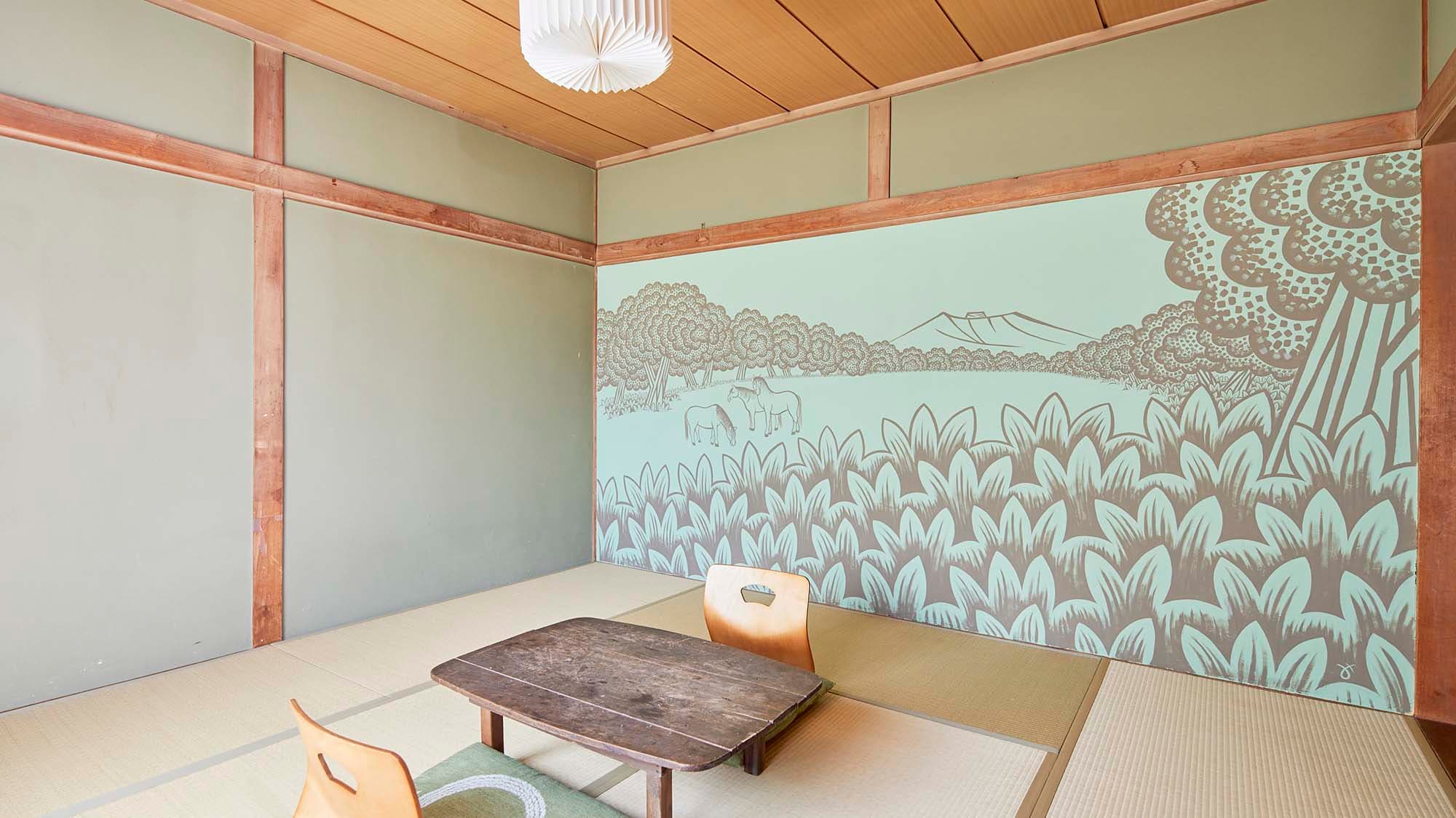 ・ [Japanese-style room] The area is 8 tatami mats. The entire wall is an art work