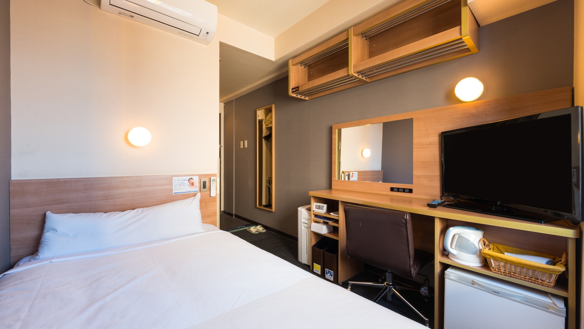 Relax and unwind in our spacious bed in our standard room (Annex).