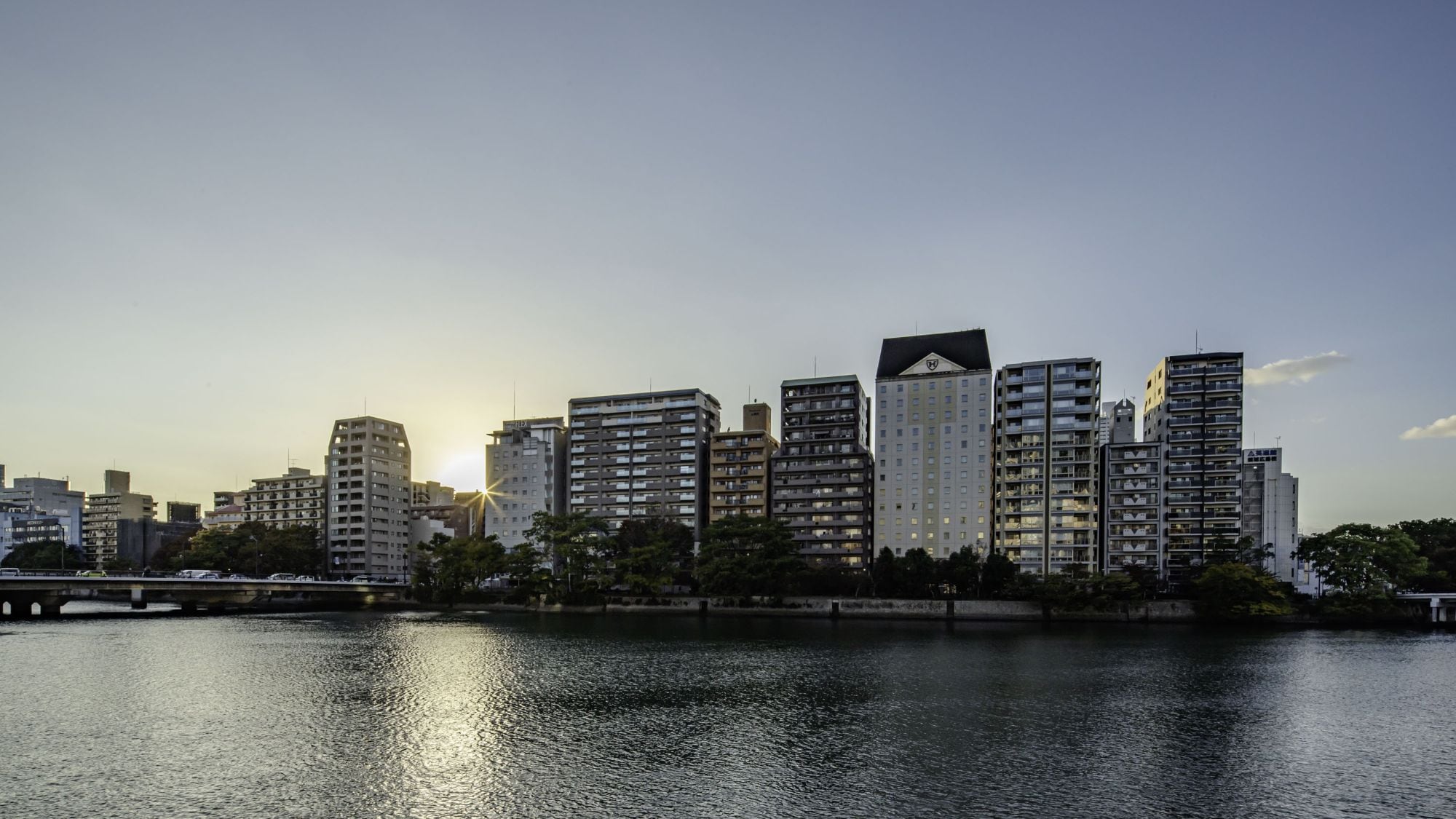 Exterior view of the hotel from the opposite bank