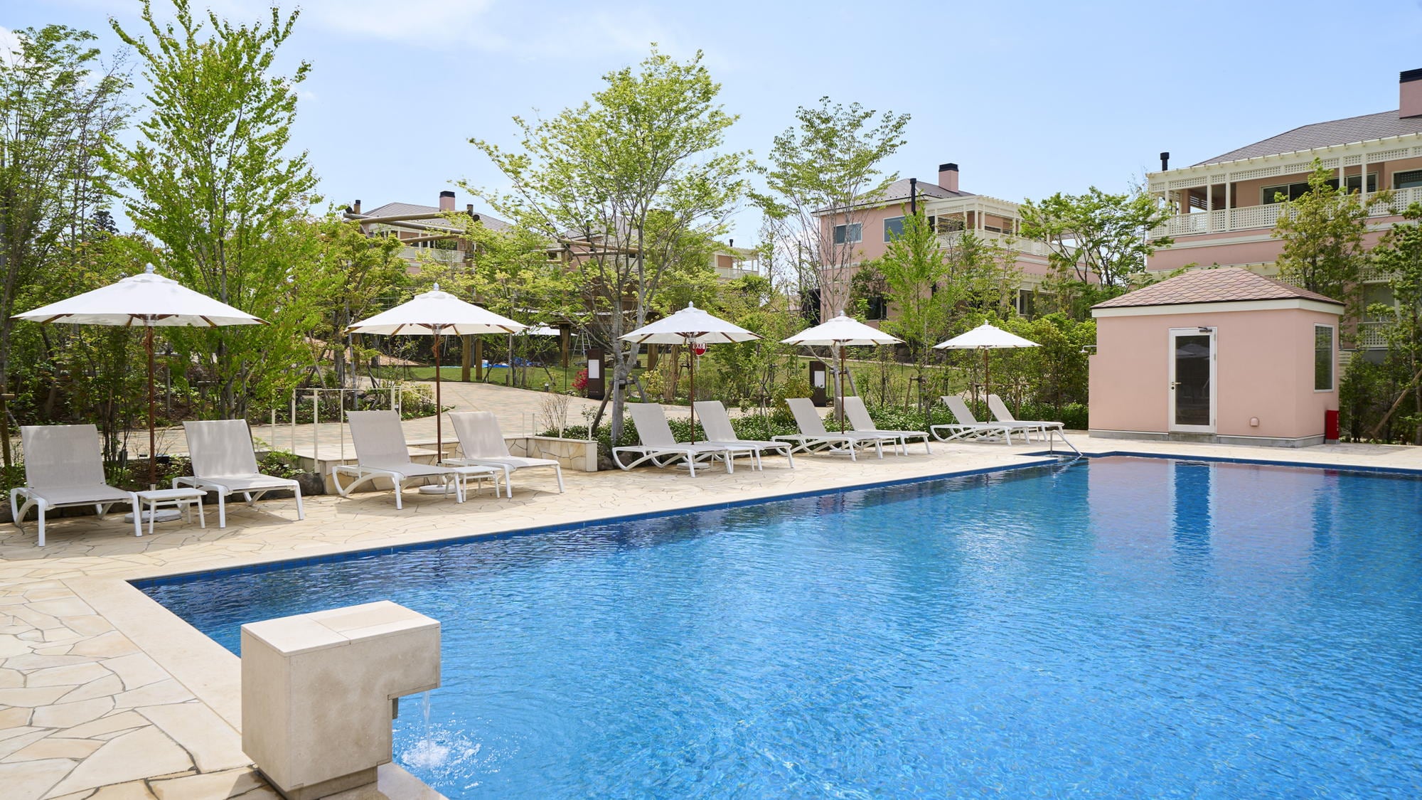 Relaxing deck chairs by the pool