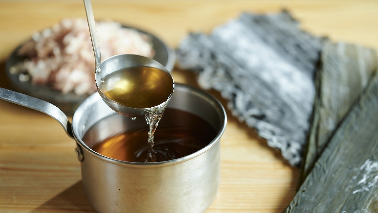 Golden dashi soup created by a dashi sommelier and a head chef