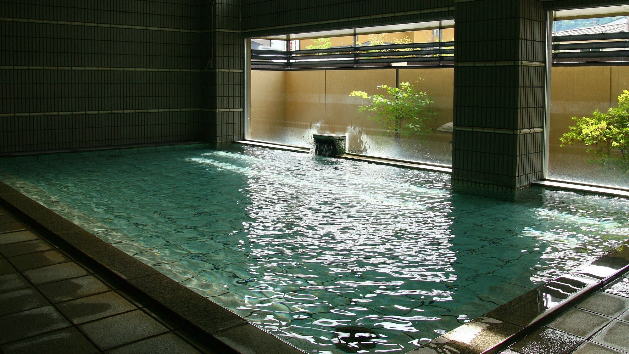 Relax in a quiet large bath overlooking the garden