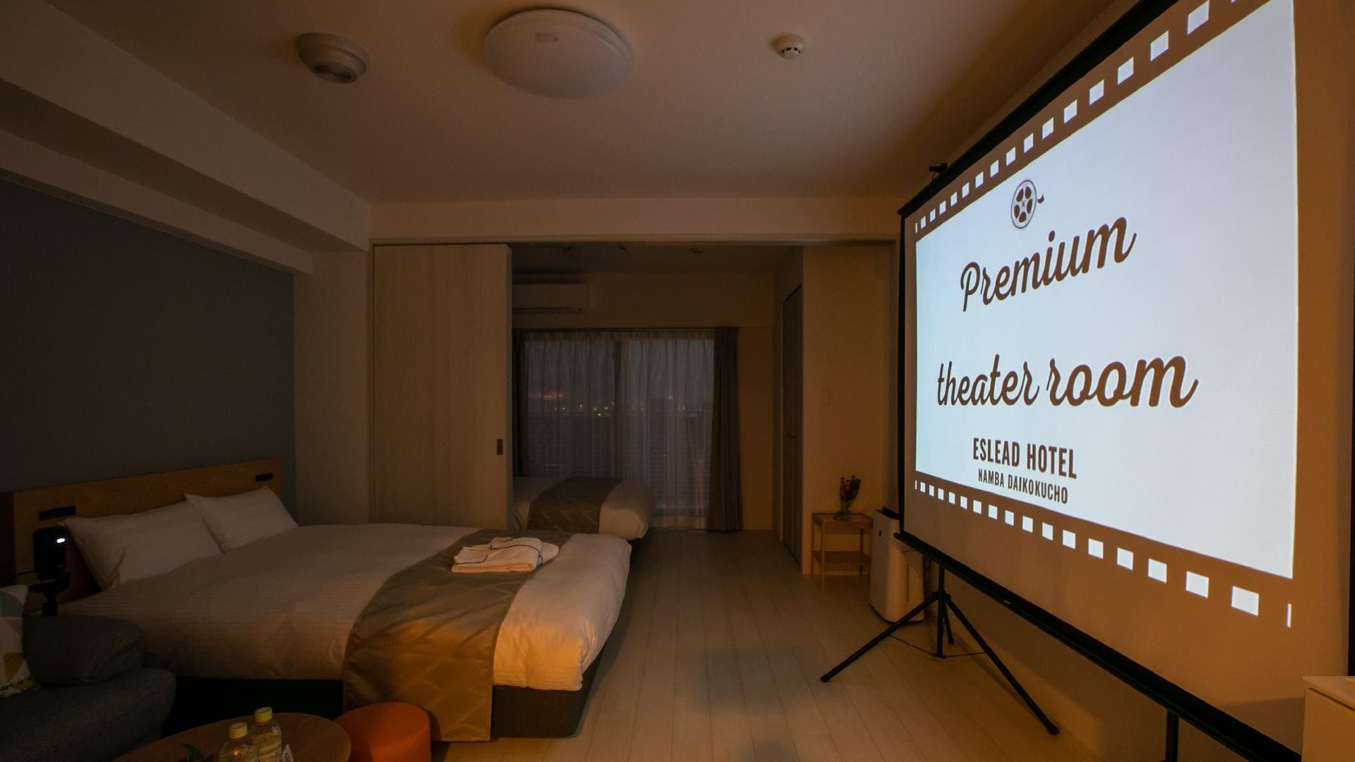 2 double beds, with partition, theater room