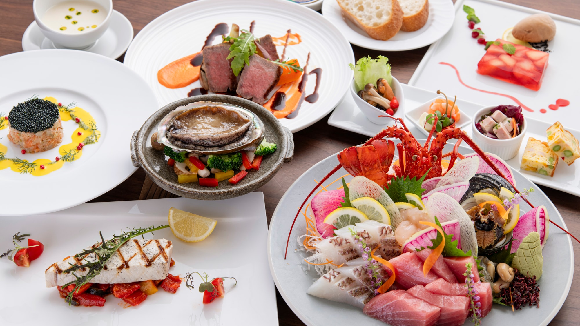 Chef's special French full course meal (example) with abalone dish, spiny lobster and seasonal sashimi platter