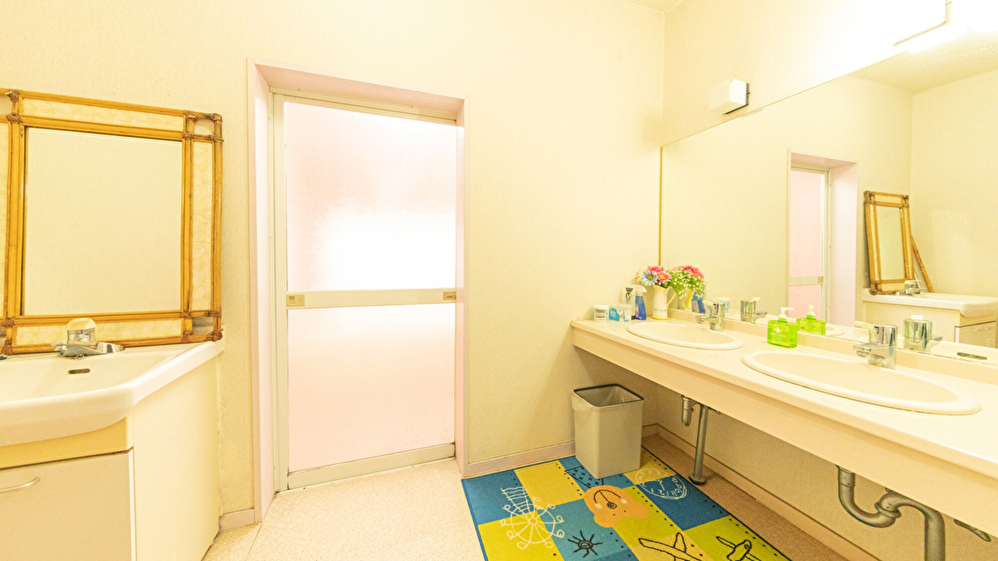 "Second floor washstand" has hair dryers, cotton swabs, and toothpaste cups