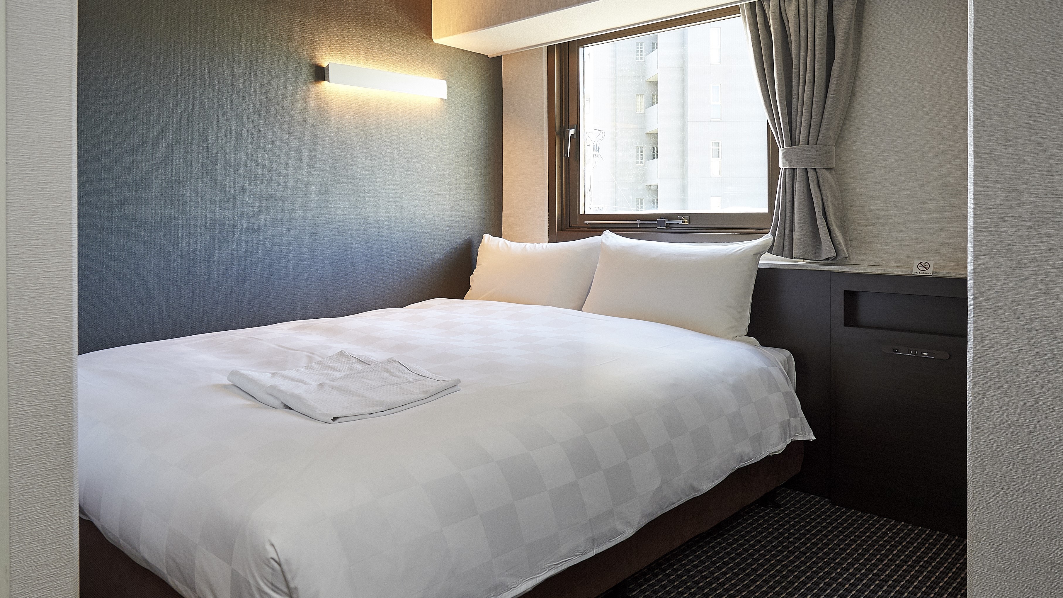 Double/140cm wide bed for a comfortable sleep. (Example of a guest room)